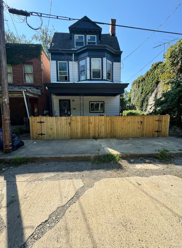 house with new wood fence in pittsburgh pa top class renovations