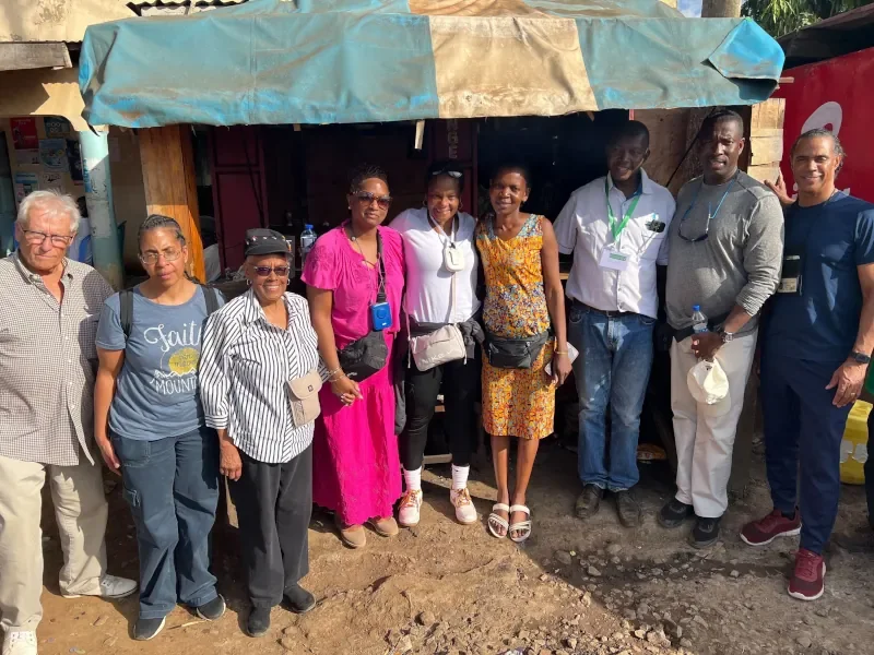 Mission team visiting local vendors that participate in micro-finance support from Life For Children Ministry in western Kenya