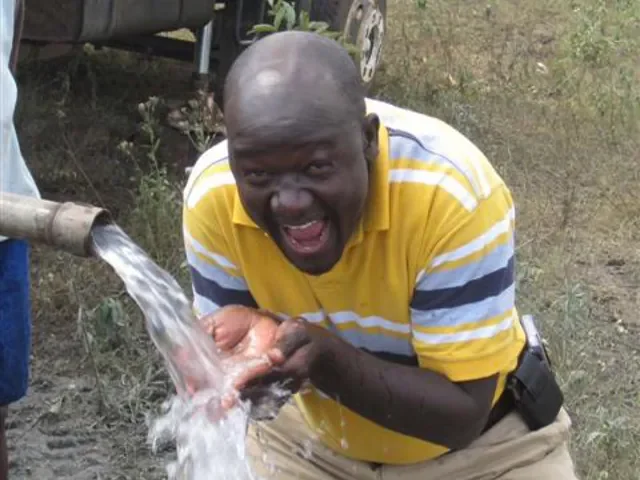 Michael Agwanda at a water well project funded by Life For Children Ministry in Kenya