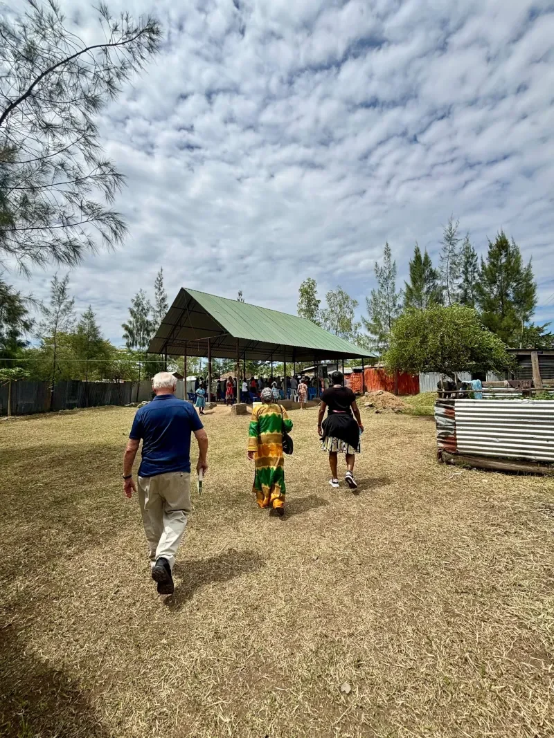 Mission team walking to a community gathering event in western Kenya
