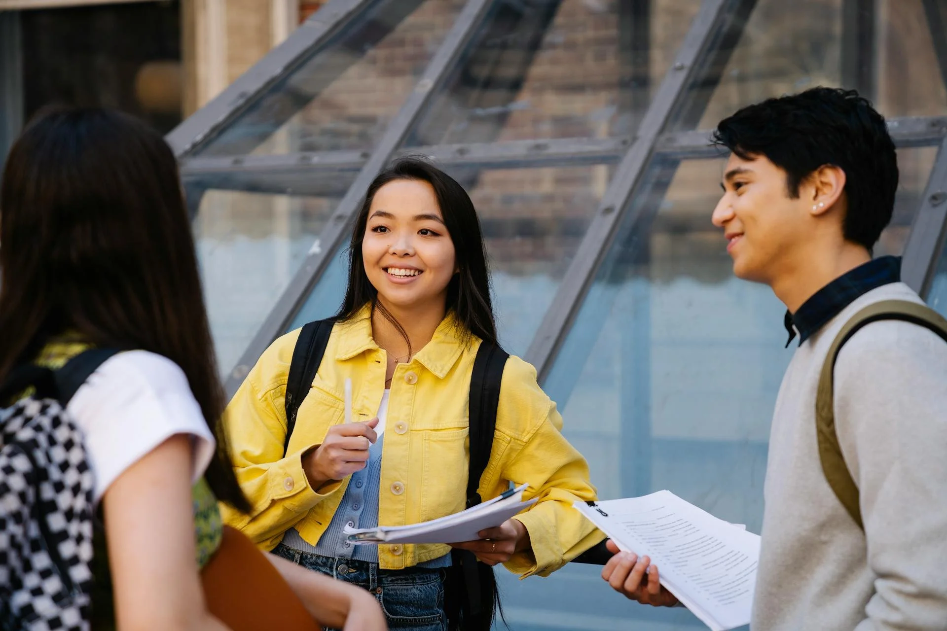 a group of international students discuss their recent test, they're covered by health insurance for international students