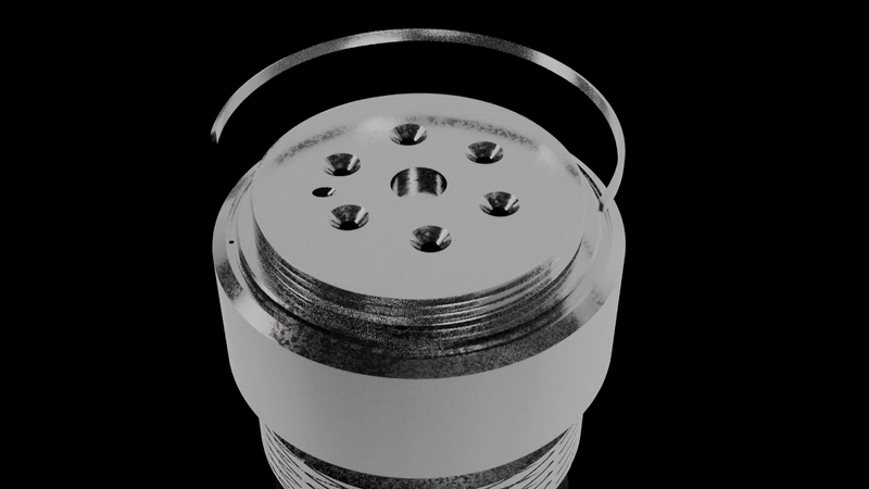 A black and white close-up of a spice shaker with a hinged lid, against a dark background.