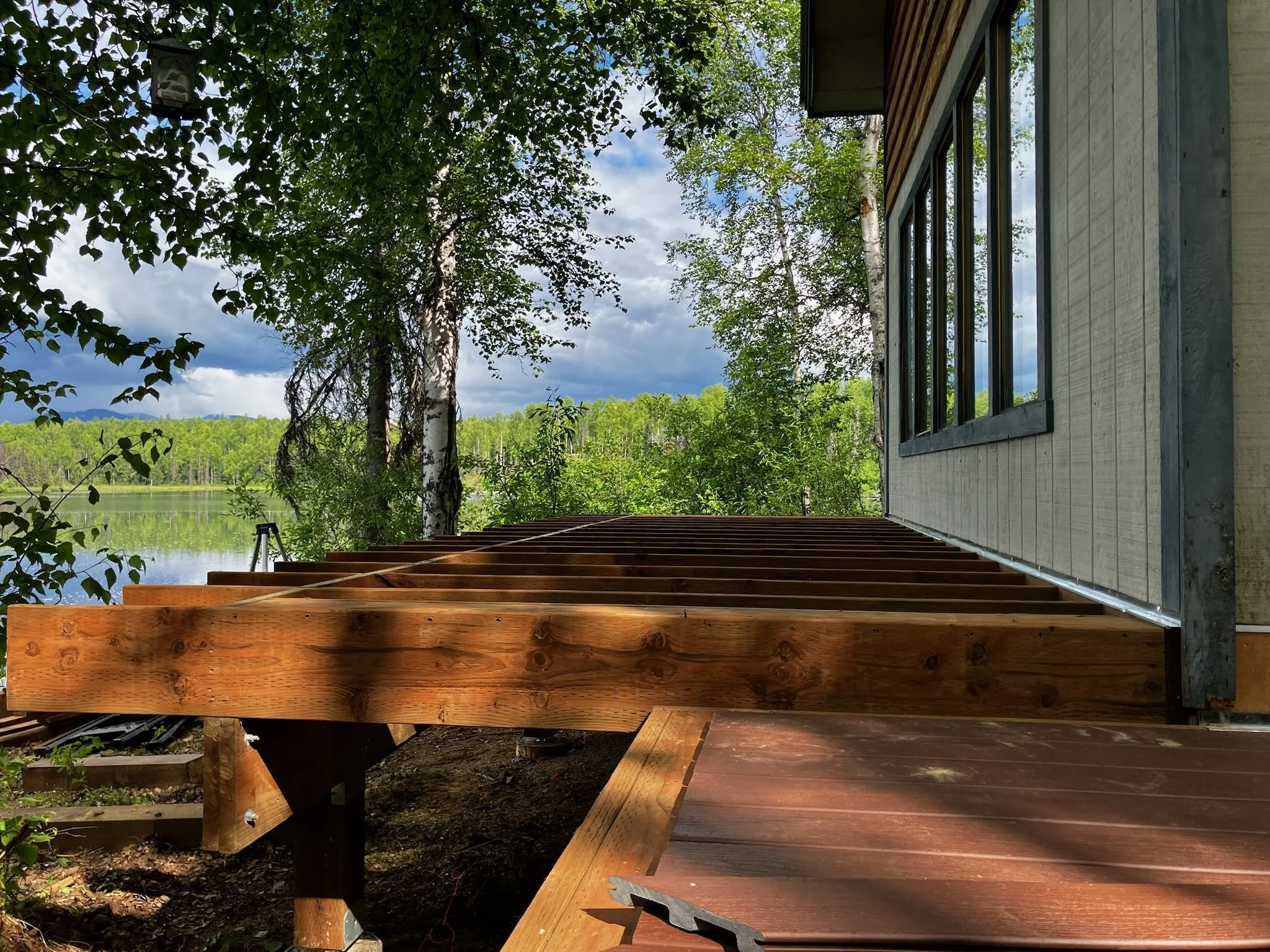 Step 5 - Install the new deck's stringers. Note the flashing used to prevent recurrence of the original issue.