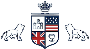 A coat of arms with a crown on top, divided into four sections. The top left has a castle, the top right has the American flag, the bottom left has the British Union Jack, and the bottom right has a cup. Two lions stand on either side of the shield.