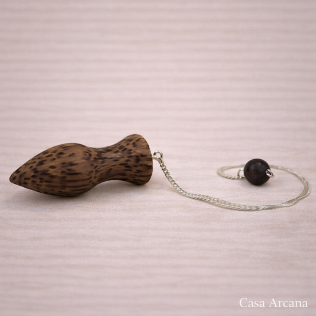 Péndulo de madera de coco