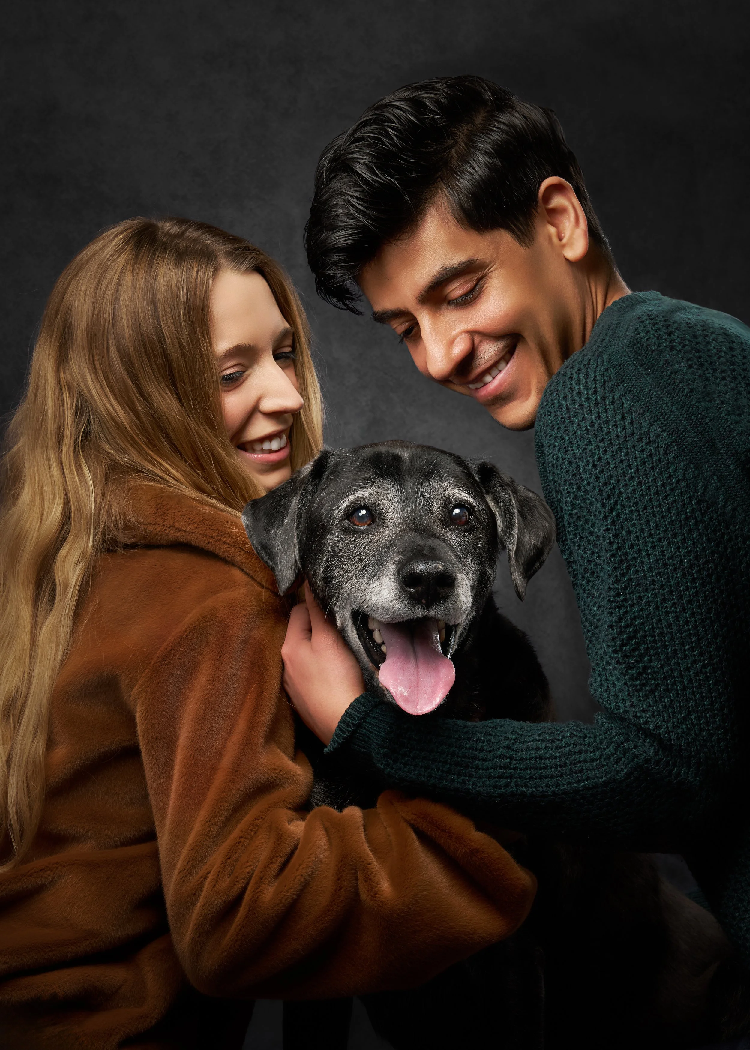 couple photographed with their senior dog in kirkland photography studio
