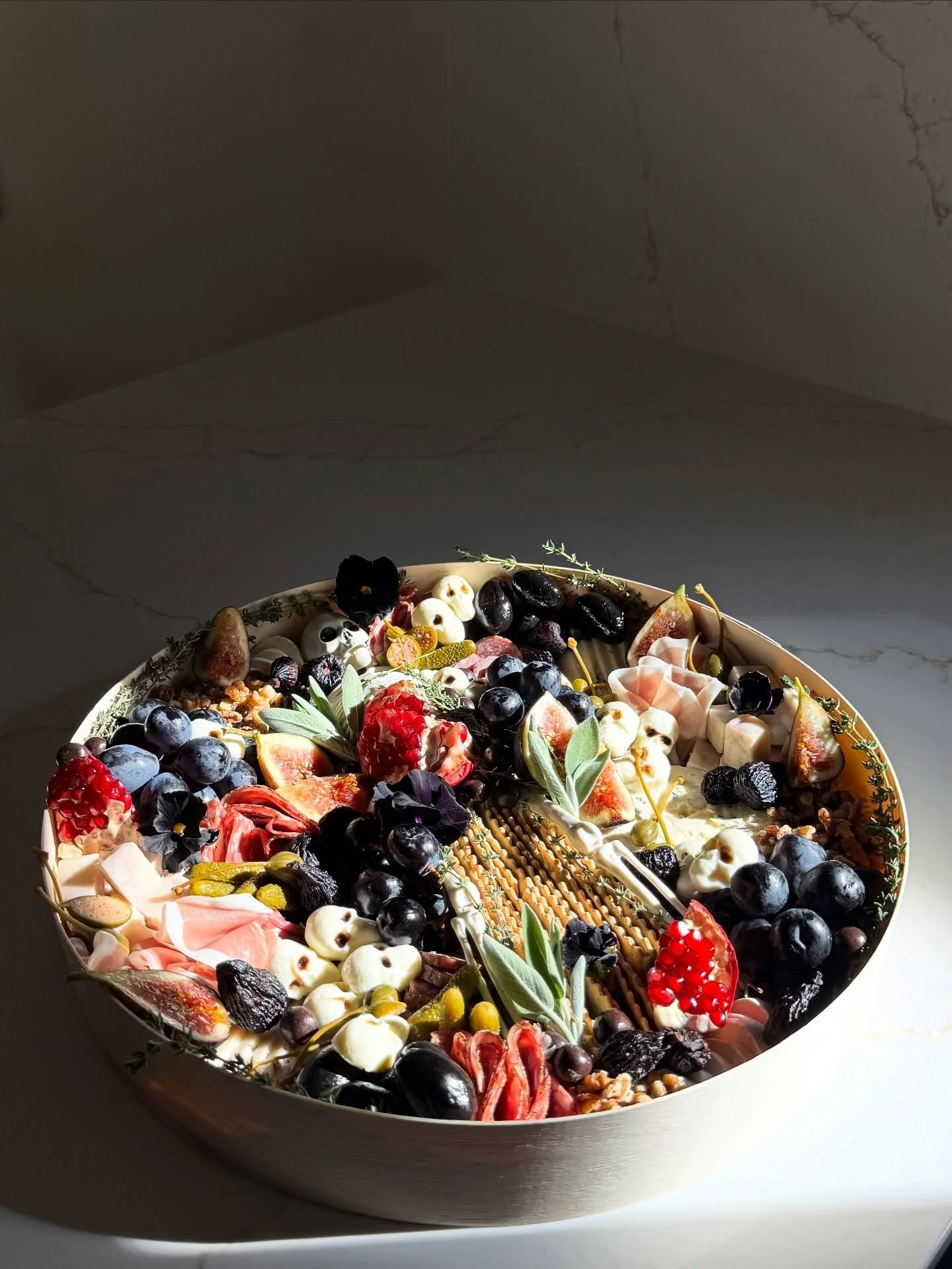 The devil is in the details 💀🖤🫐🧀🫒
&bull;
Halloween edition of Grazed spooky box is guaranteed to scare off your guests!👻
&bull;
Order yours now! All orders must be received by eod Wednesday! 🖤
#halloweencharcuterieboard #halloween2025