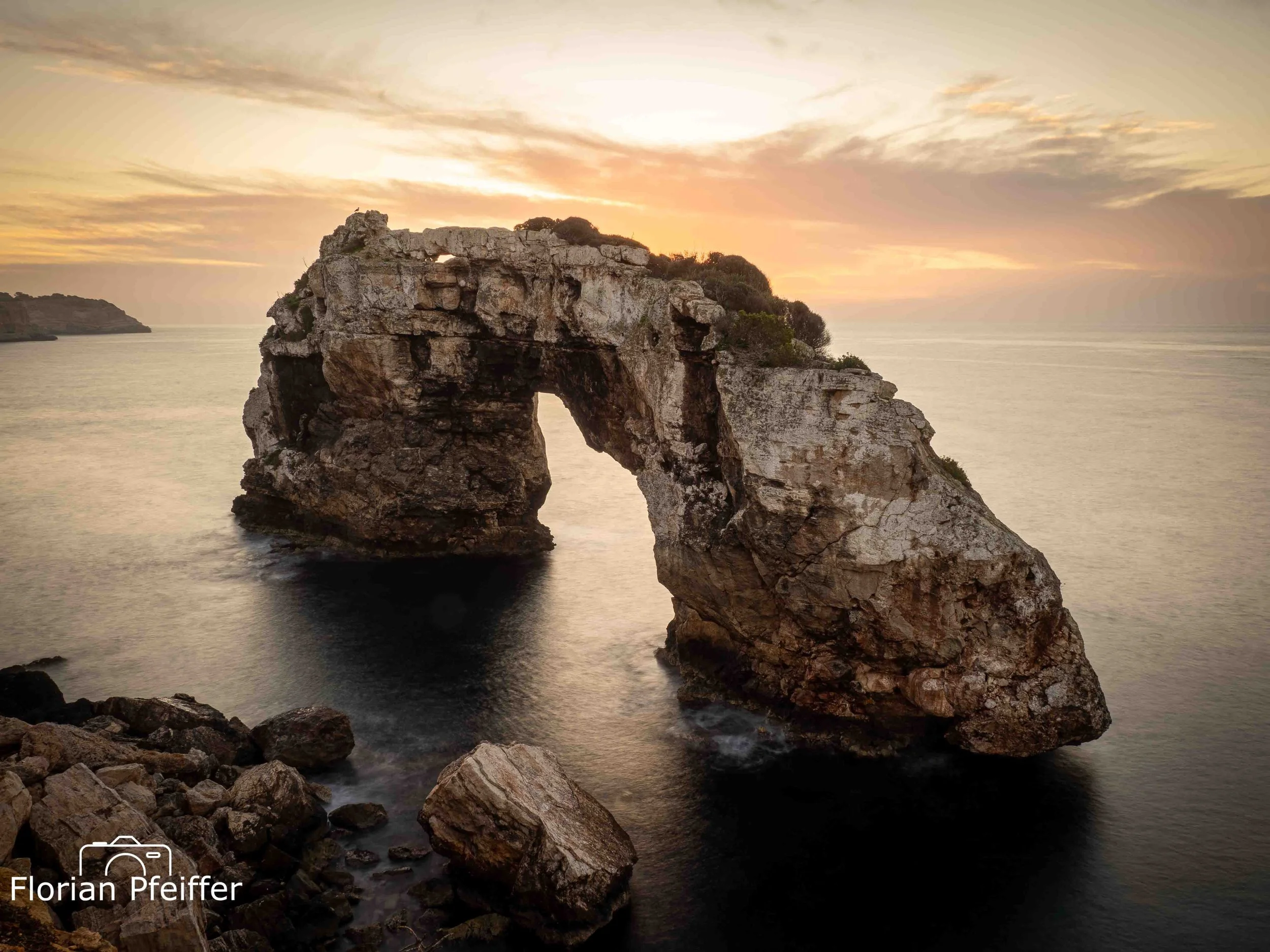 landscape photography of a rock formation during sunset on the coast
