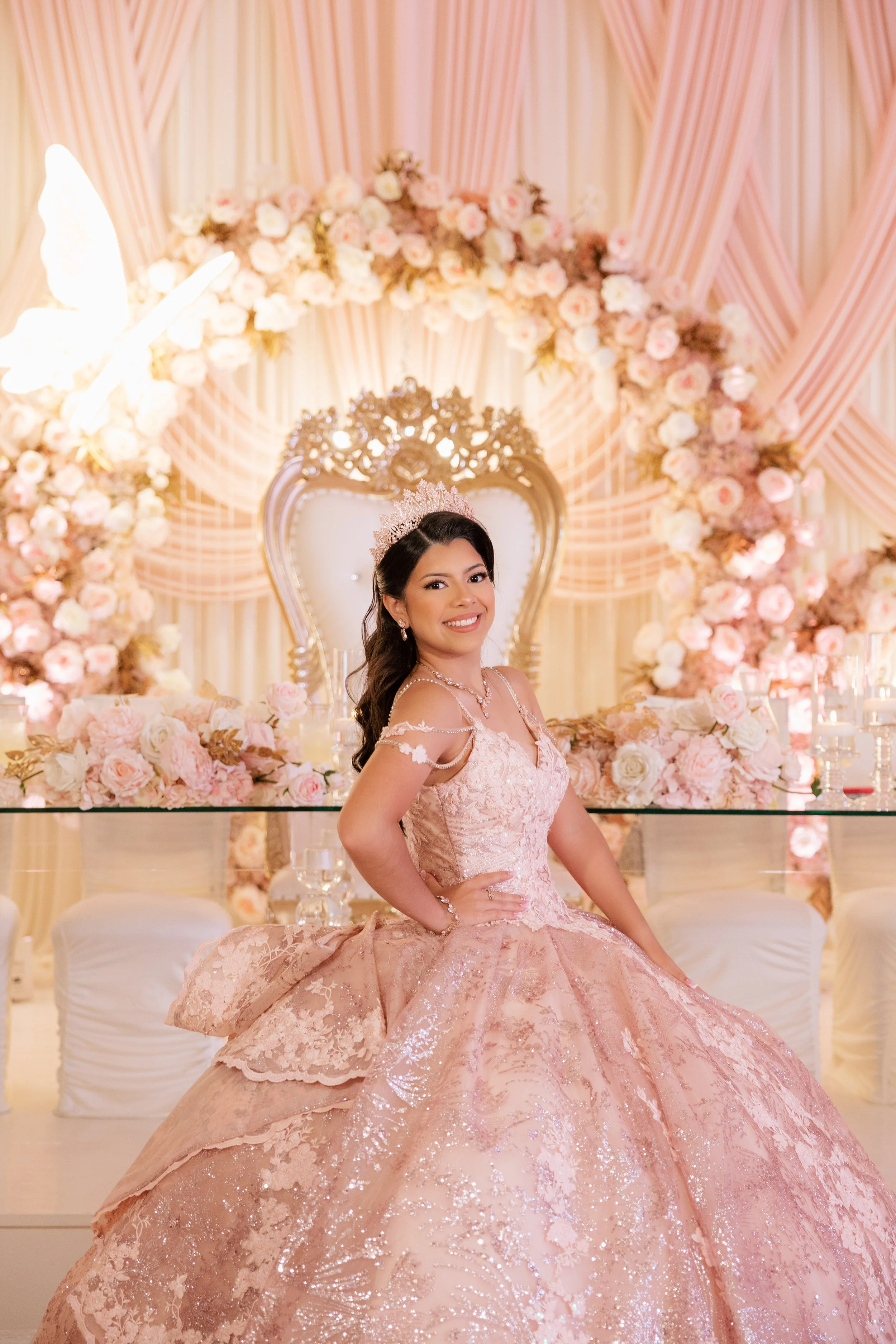 Quinceañera portrait in a pink gown at her Dallas reception
