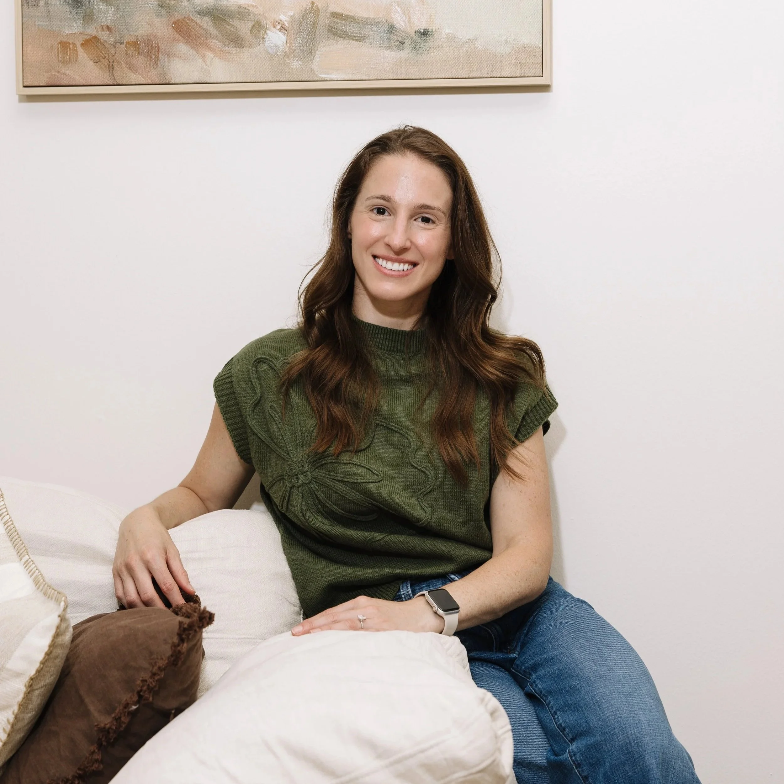 Brunette Therapist on cream couch