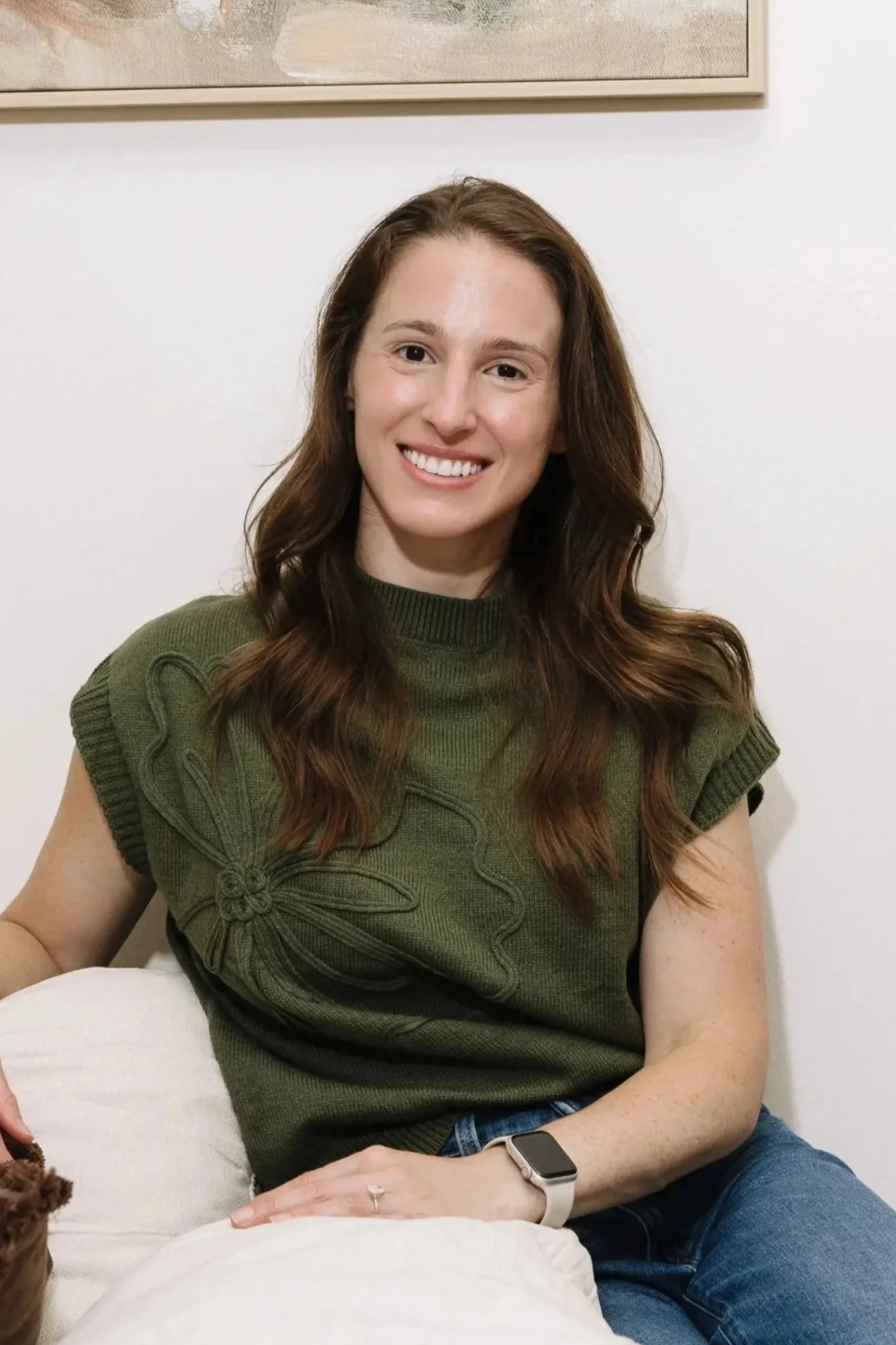 Brunette Therapist on cream couch