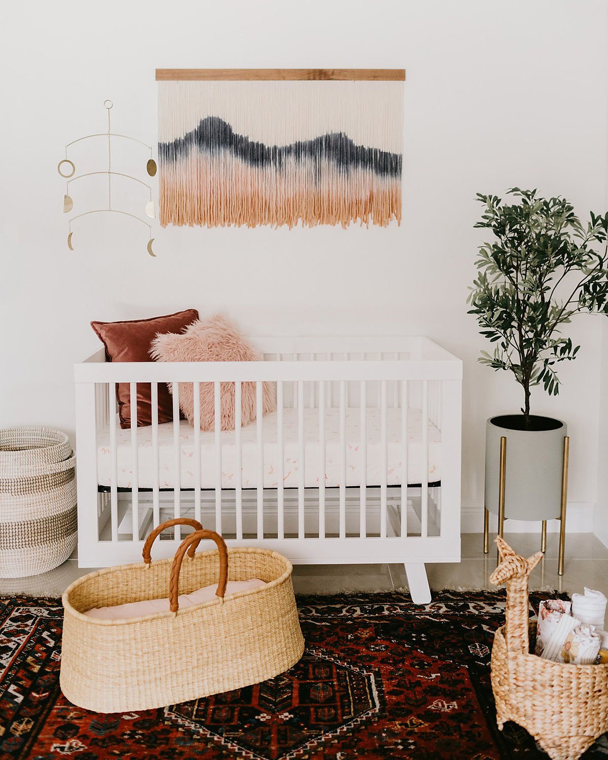 Picture of a crib and bassinet