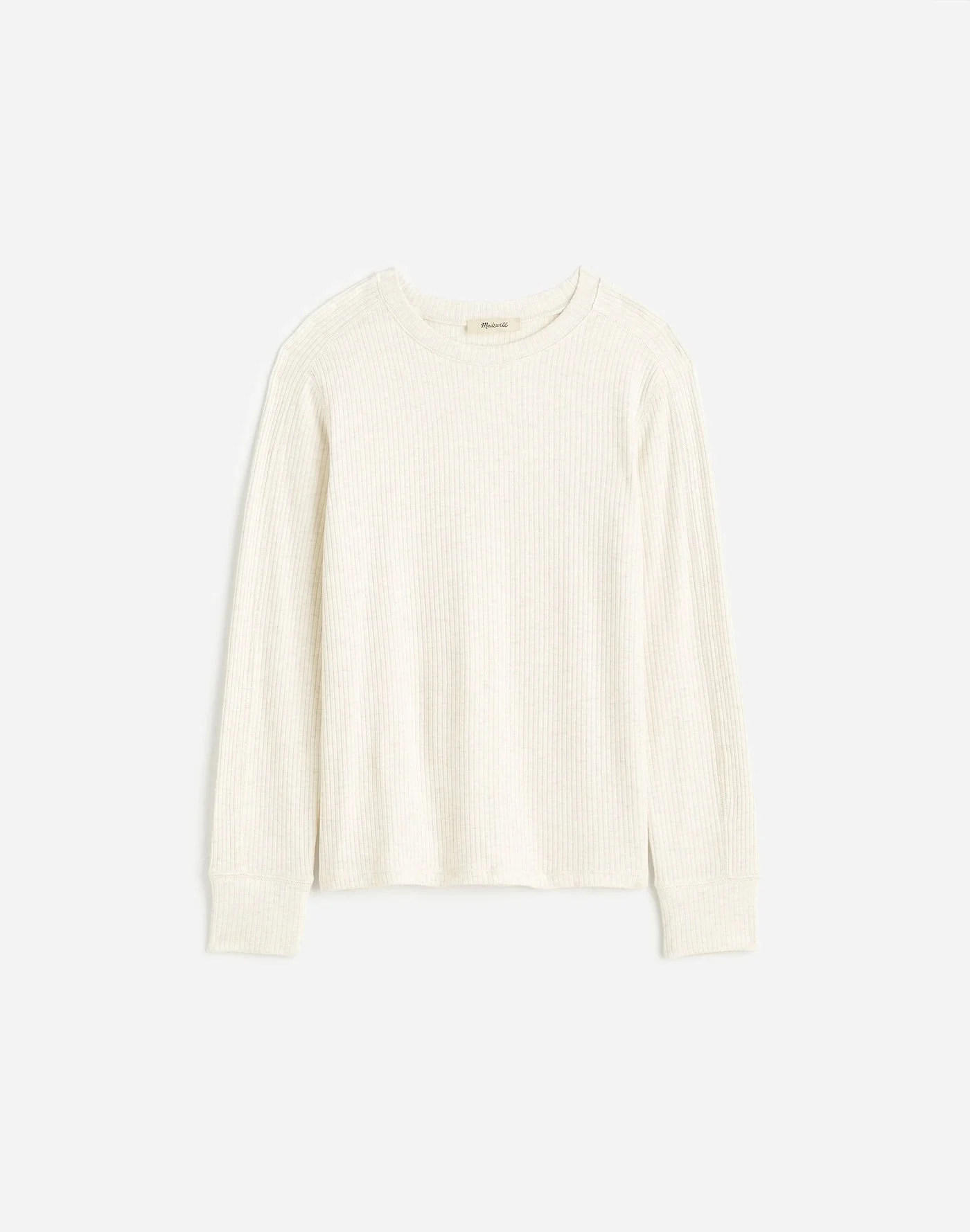 Long-sleeve beige ribbed shirt on white background