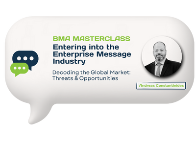 Presentation slide with title 'BMA Masterclass: Entering into the Enterprise Message Industry' and subtitle 'Decoding the Global Market: Threats & Opportunities.' Featuring a photo of Andreas Constantindes and speech bubble icons.