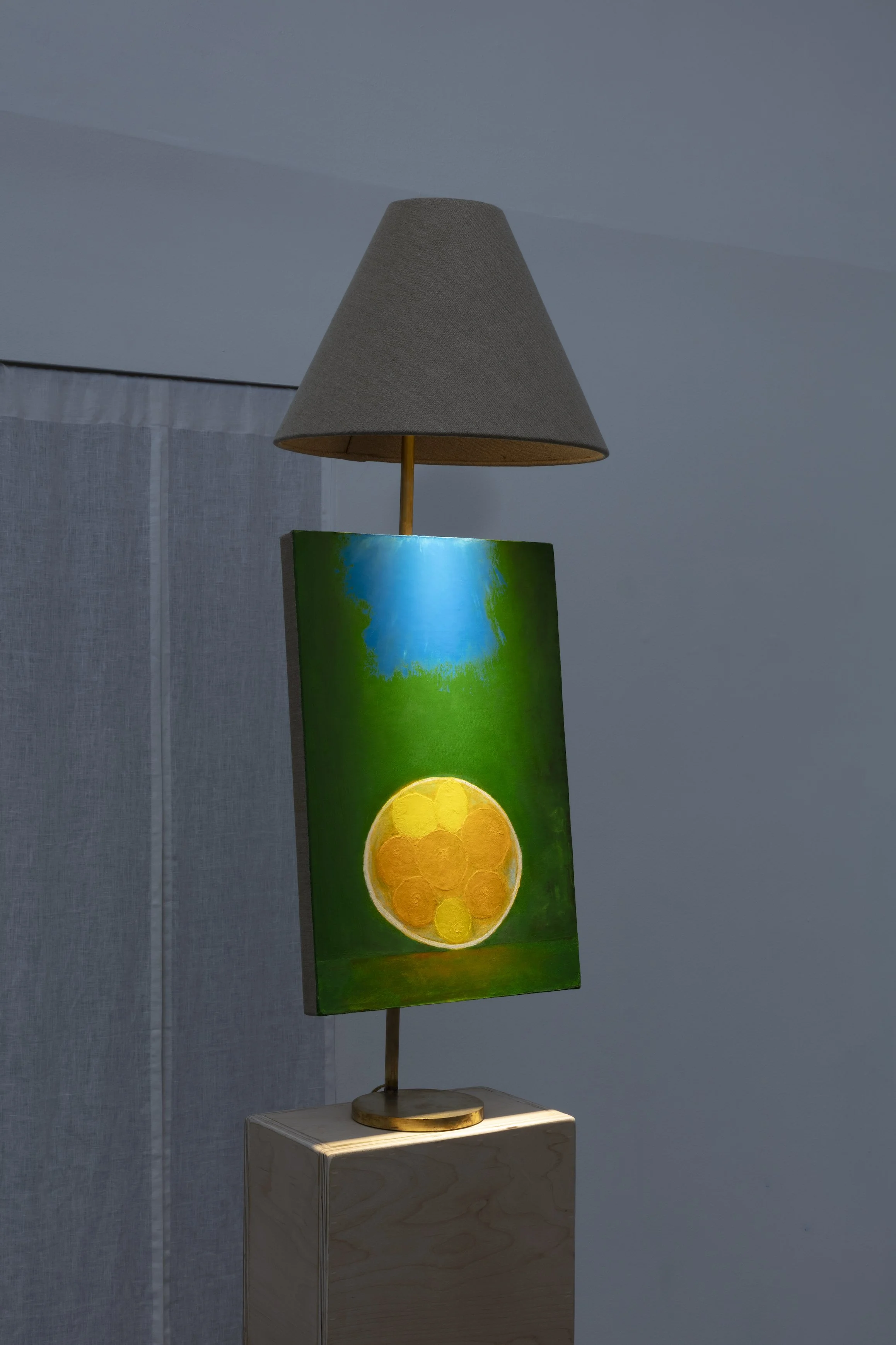 Dustin Metz, Fruit Bowl with Sky Light, 2025, oil on canvas on custom brass lamp, 42 x 15 x 15 in. Image courtesy Josh Schaedel.