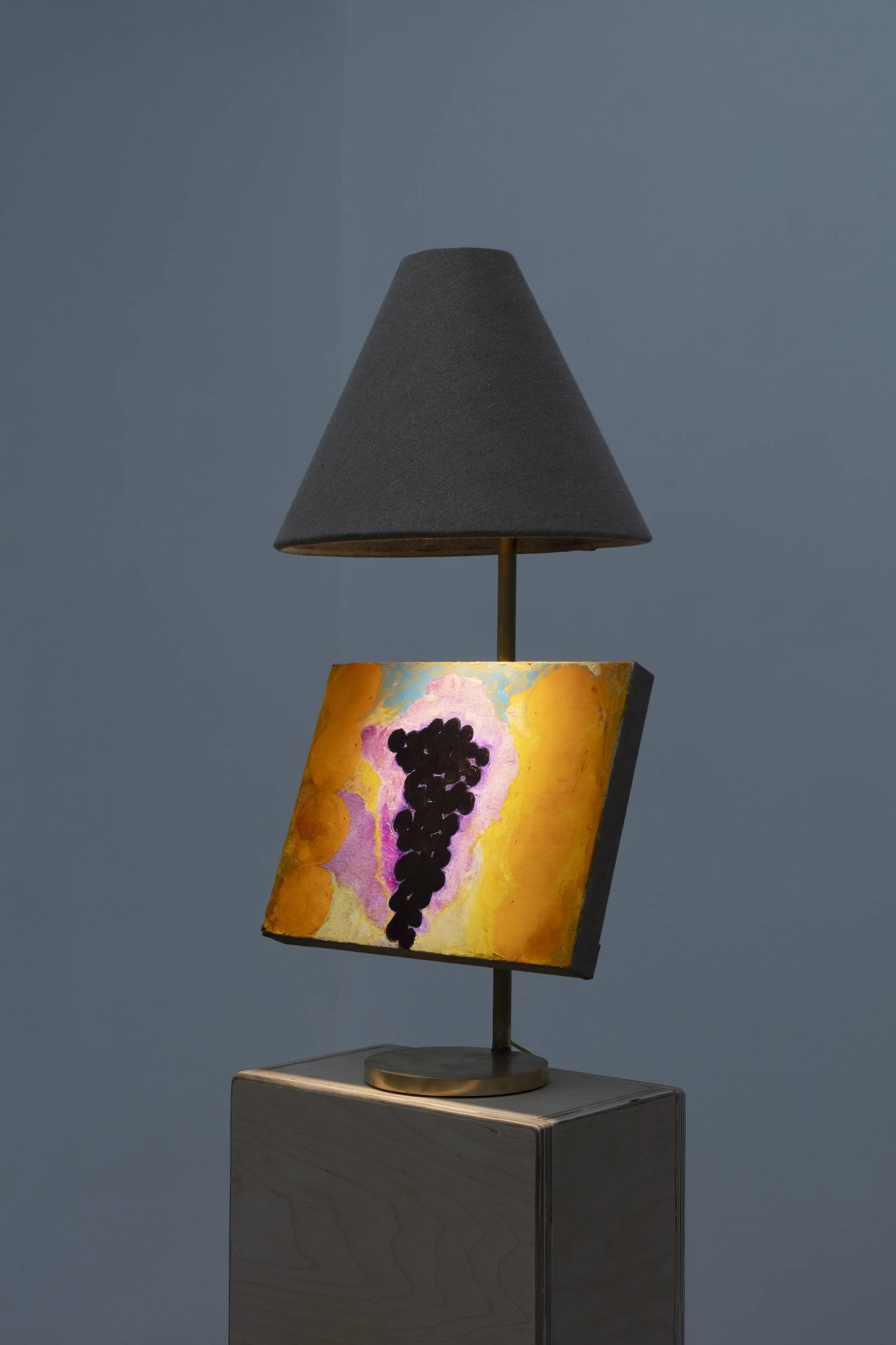 Dustin Metz, Enter the Grapes, 2025, oil on canvas on custom brass lamp, 32 x 15 x 15 in. Image courtesy Josh Schaedel.