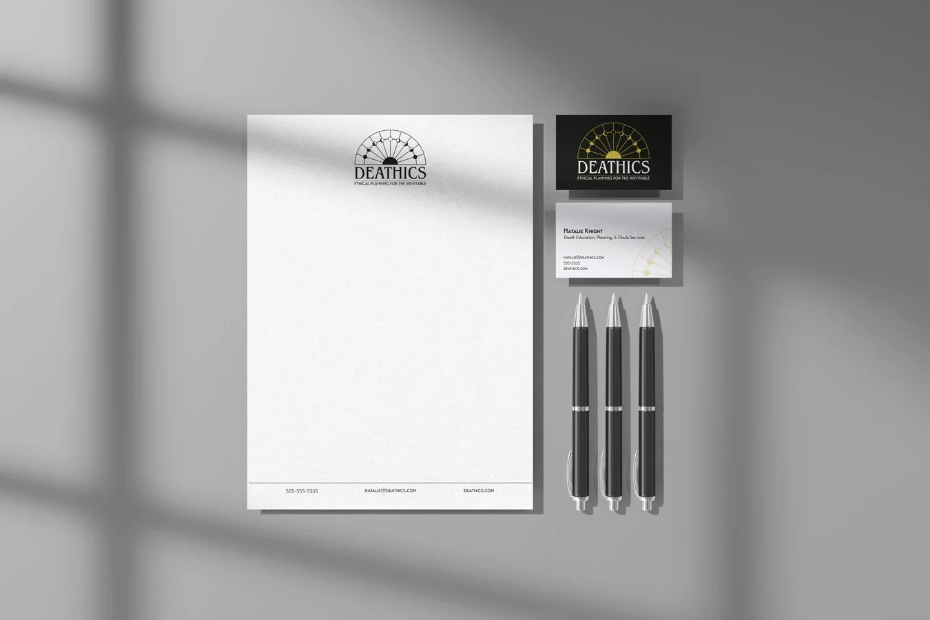 Deathics_Letterhead_BusinessCard_Mockup.jpg