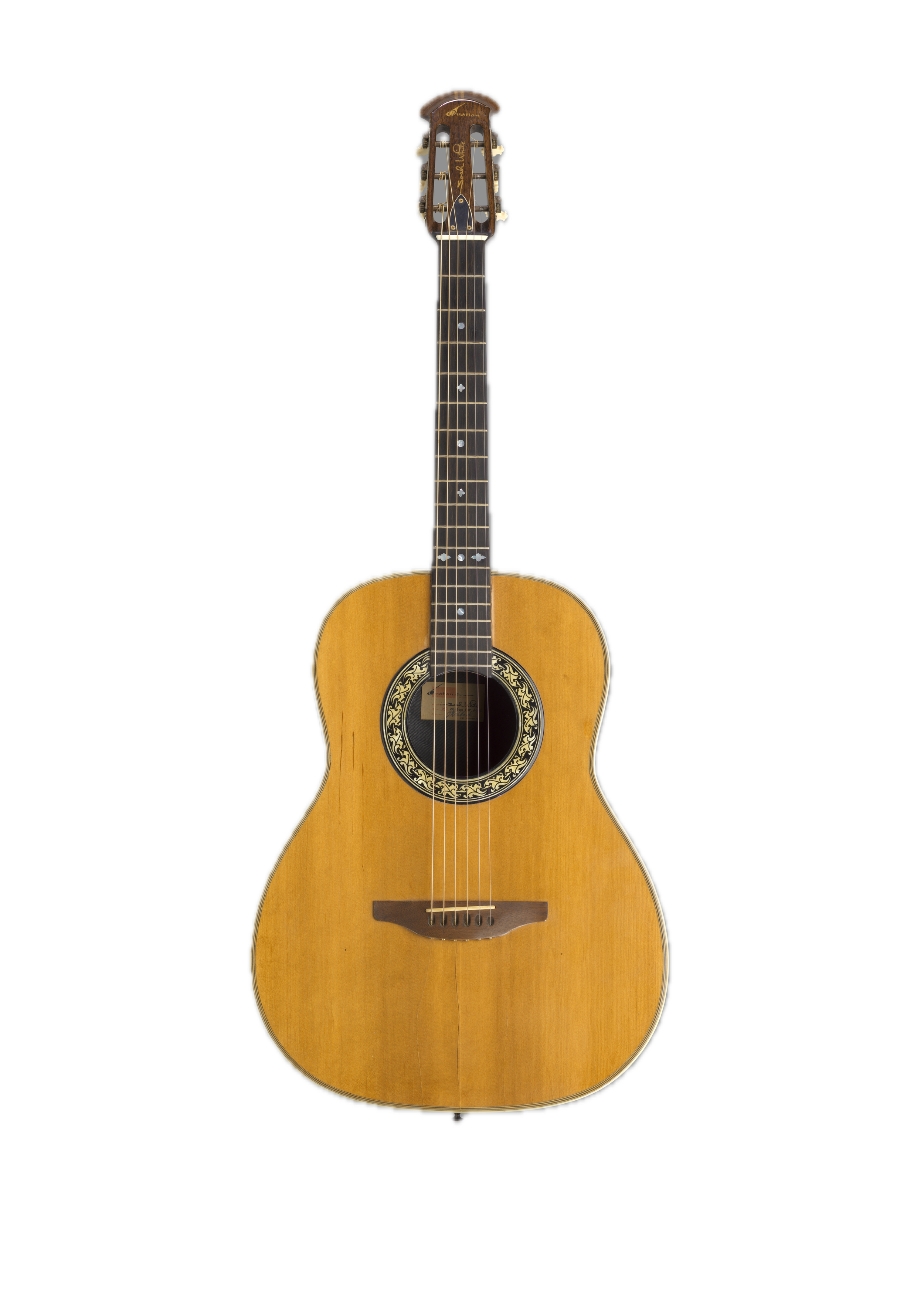 An acoustic guitar with a wooden body.