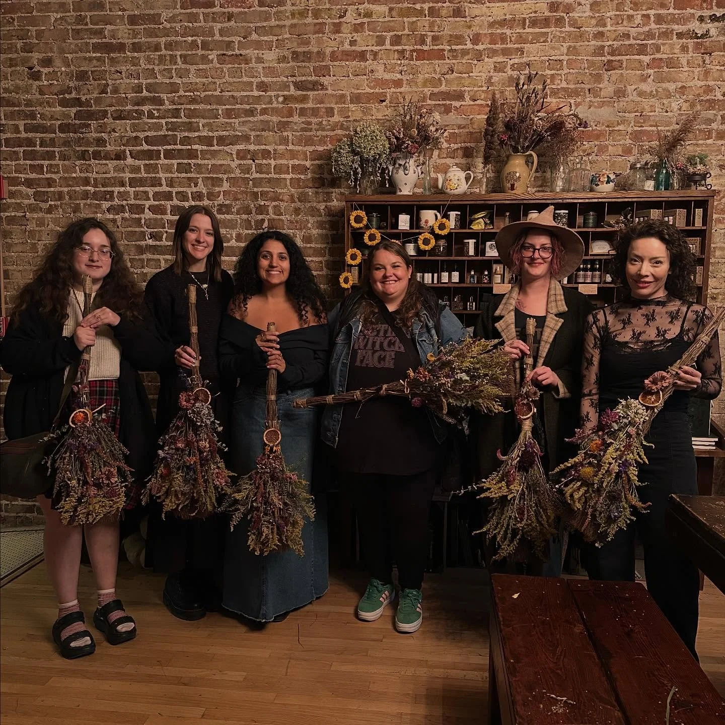 just a few witches with our broomsticks 🧹✨ 

Cinnamon floral broomstick class was the perfect way to usher in Halloween week! 🖤