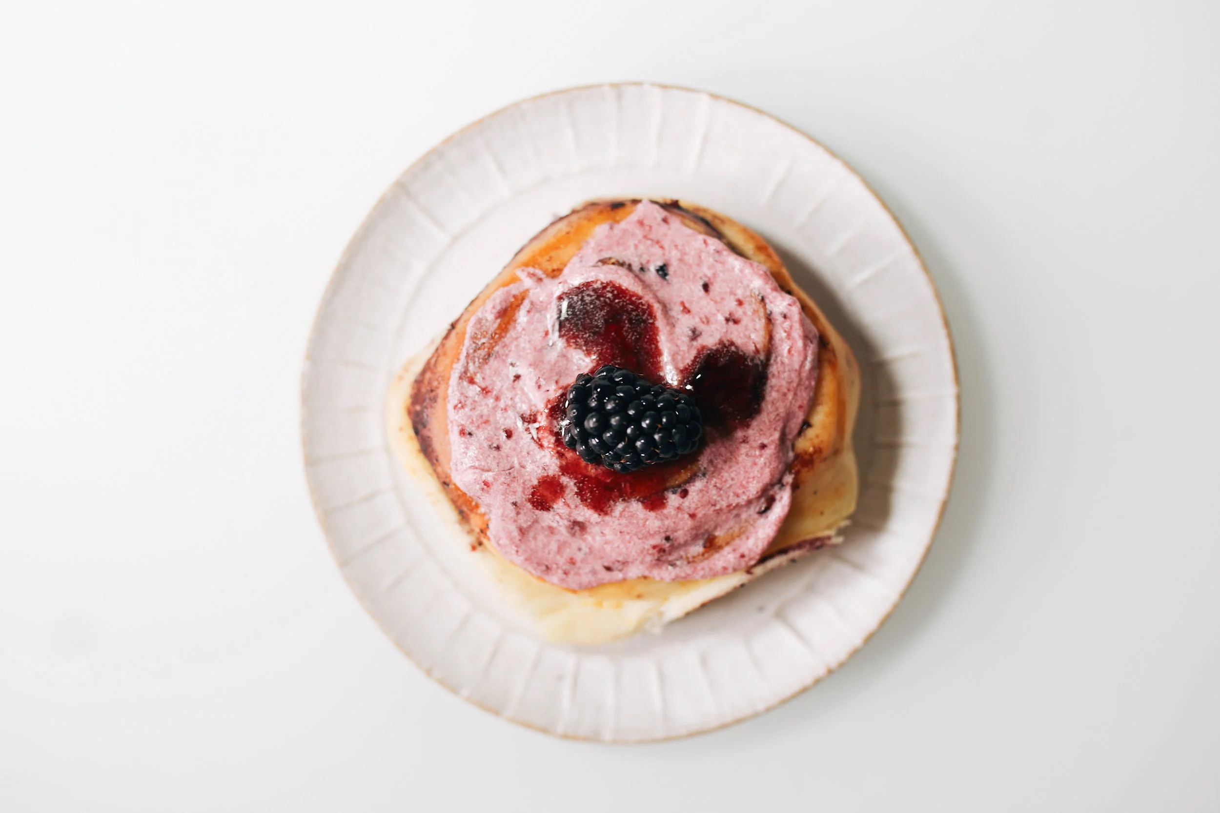Wild Berry Cinnamon Rolls with Icelandic Skyr Frosting