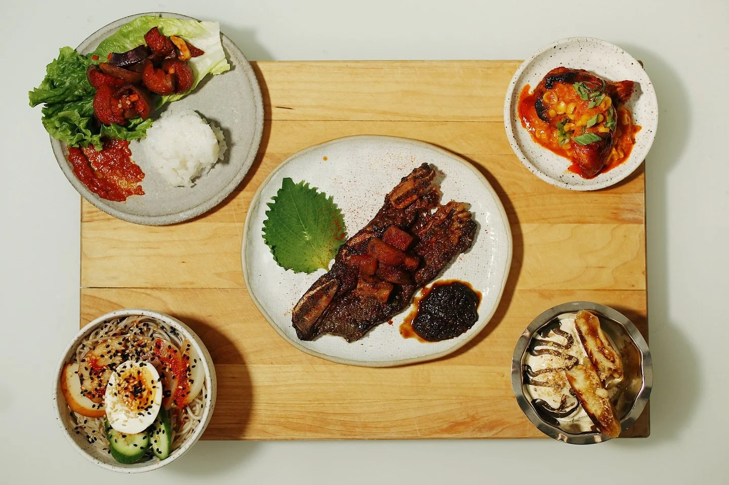 Korean BBQ 🔥

&bull;Buldak Chicken Wings with Cheesy Corn
&bull;Naengmyeon with Soft Boiled Eggs
&bull;Eggplant Bossam with Ssamjang
&bull;Beef Galbi with Soy Braised Radish
&bull;Hotteok a la Mode with Honey Corn Ice Cream by @dearsaturdays 

📸 @c