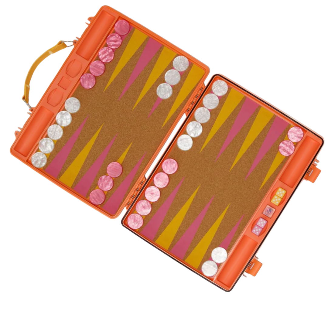 A backgammon set with an orange case, featuring a game board with pink and yellow triangles and white and pink checkers.