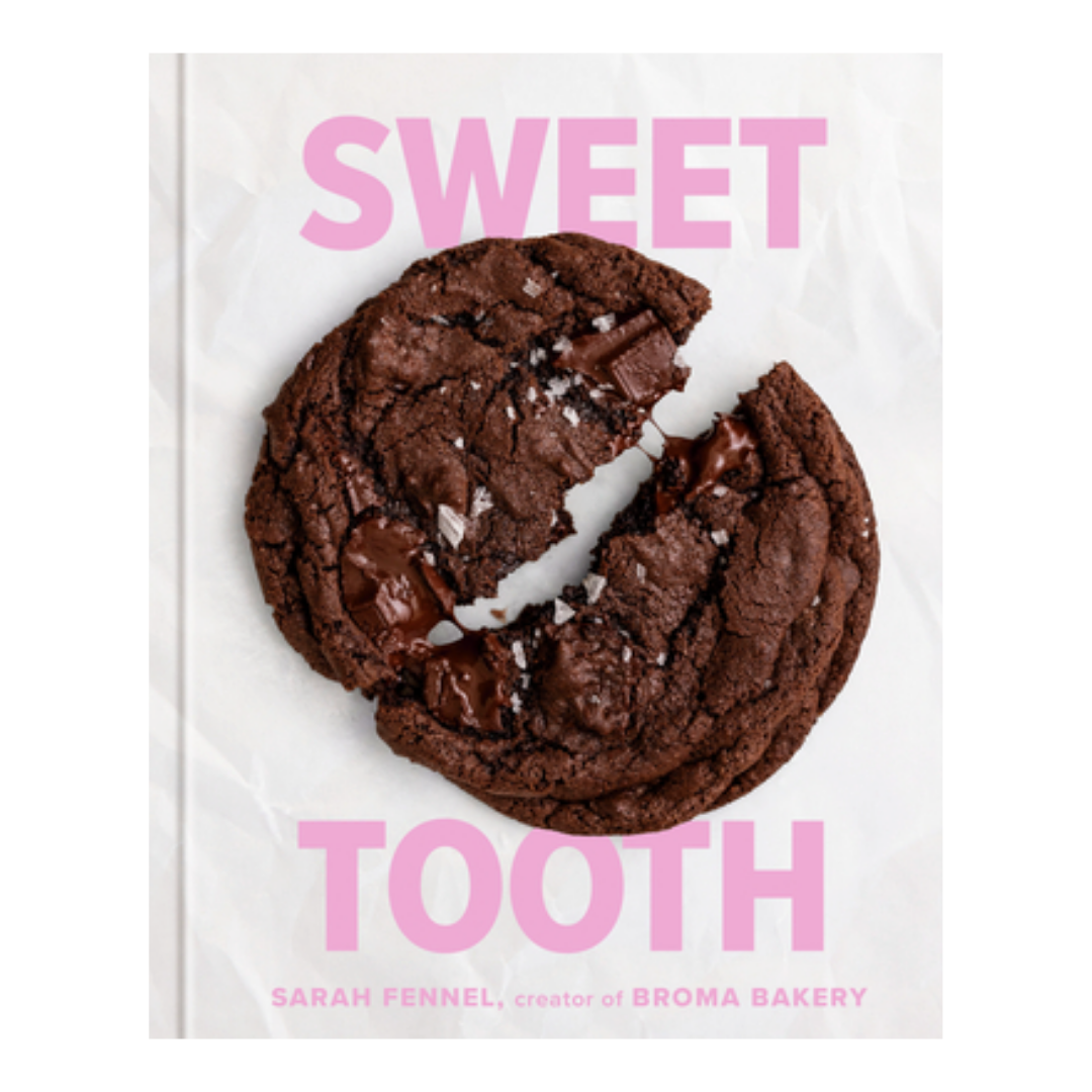 Book cover featuring a broken chocolate cookie on white paper, with the title 'Sweet Tooth' in pink letters, and author Sarah Fennel's name below.