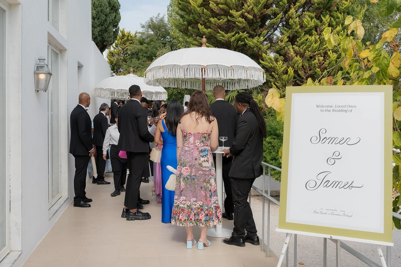 Natural moments between wedding guests during a destination wedding in Portugal