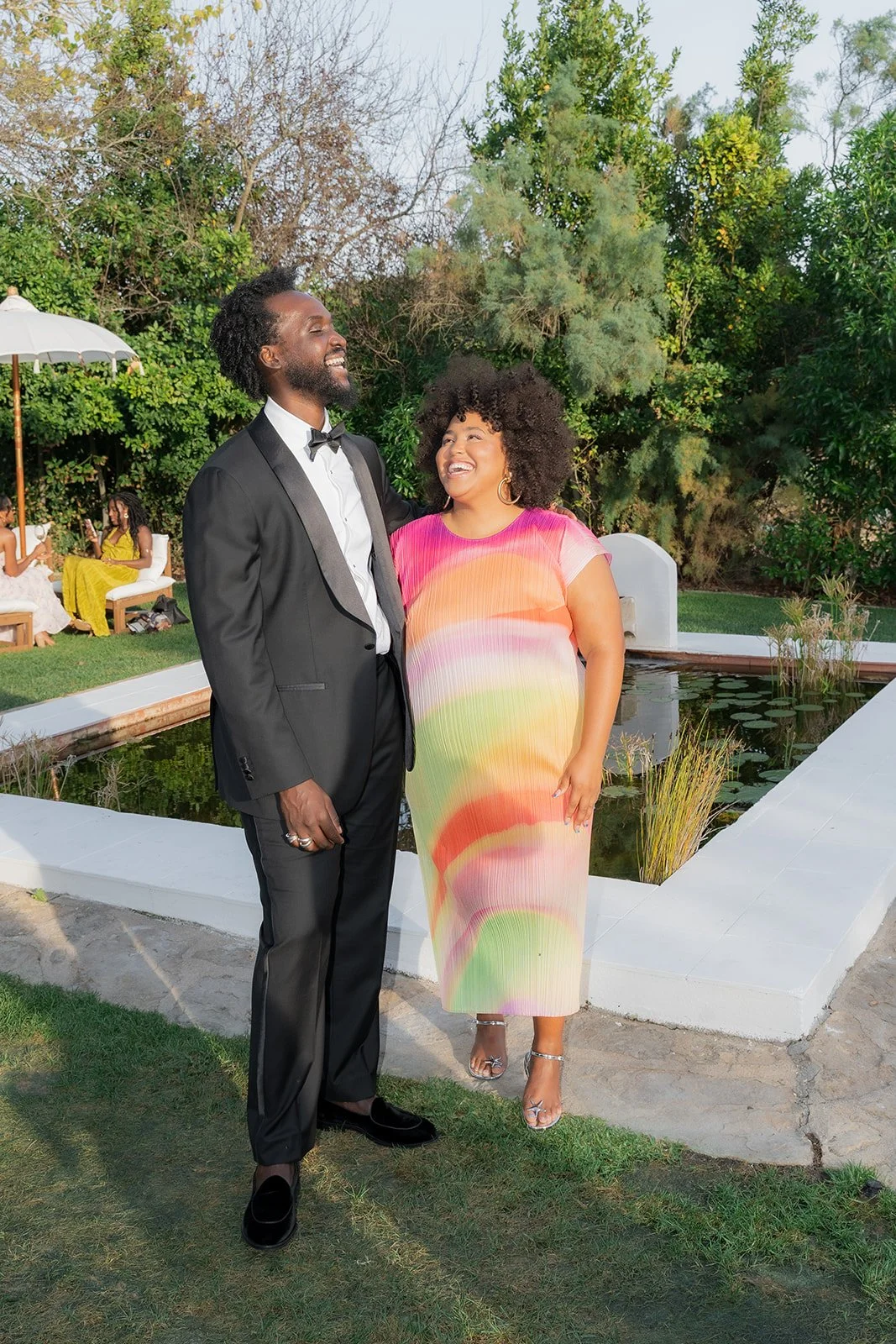 Wedding guests during cocktail hour at a destination wedding in Portugal