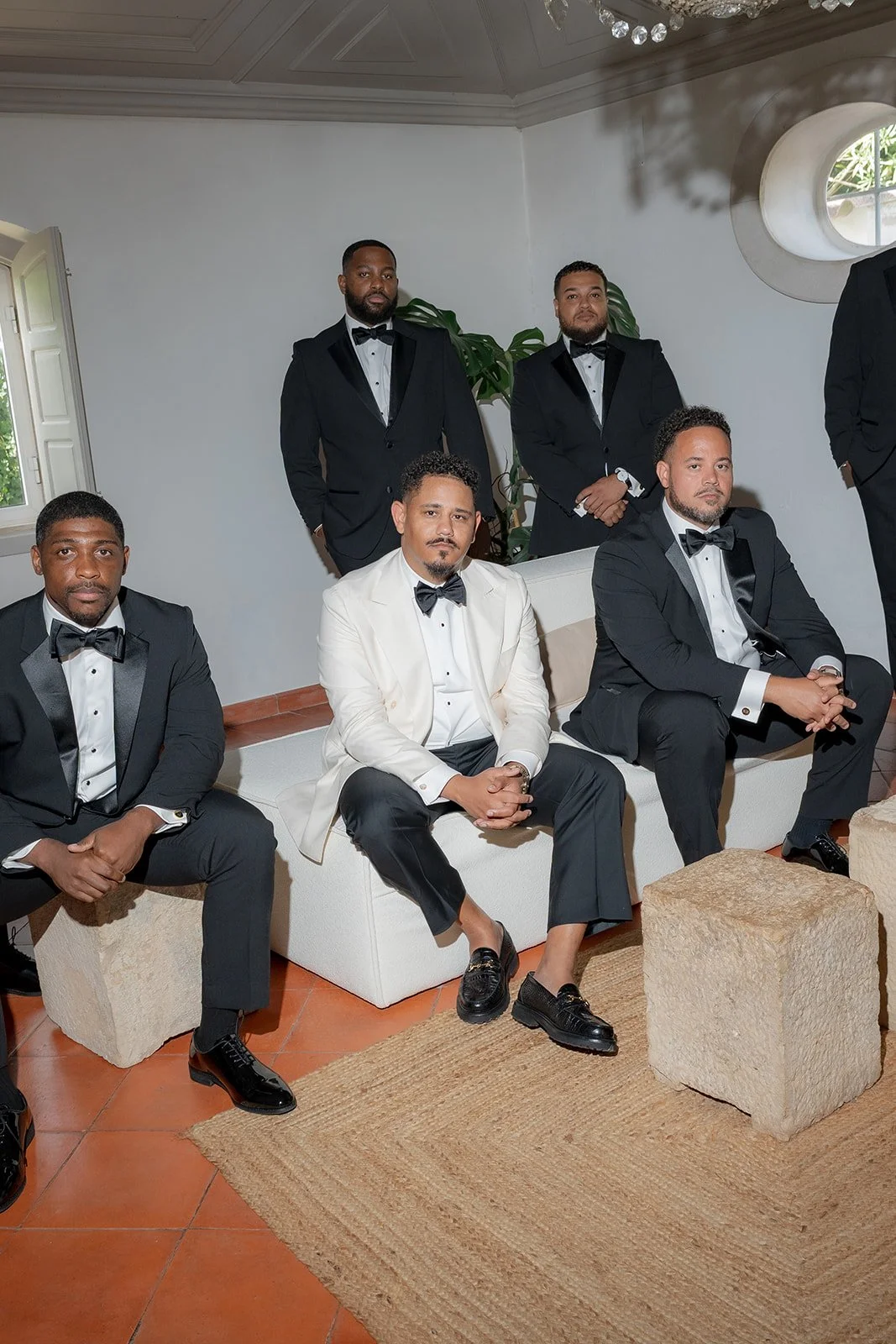 Editorial portrait of groom and his groomsmen