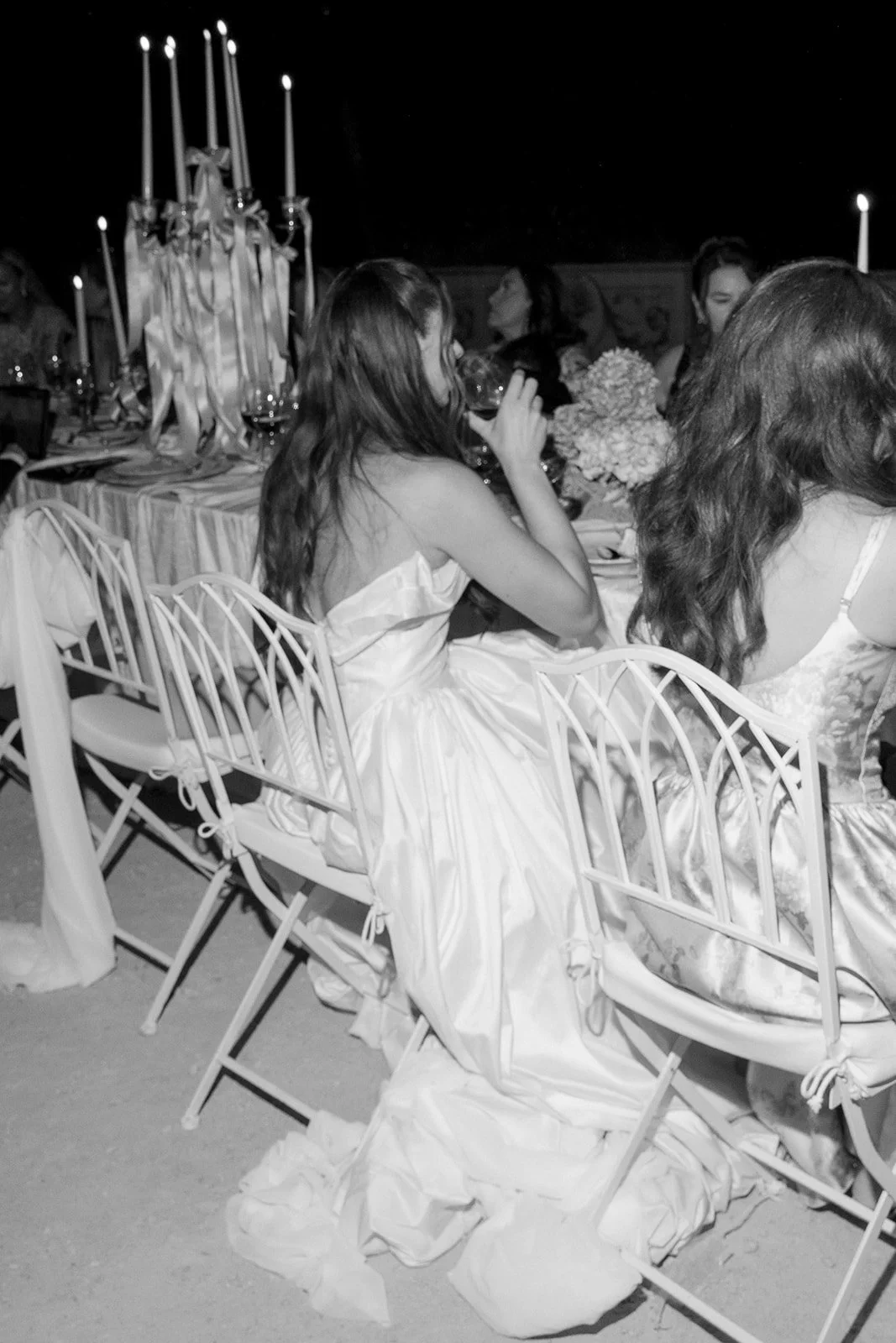 Bride seated at her wedding reception in Portugal