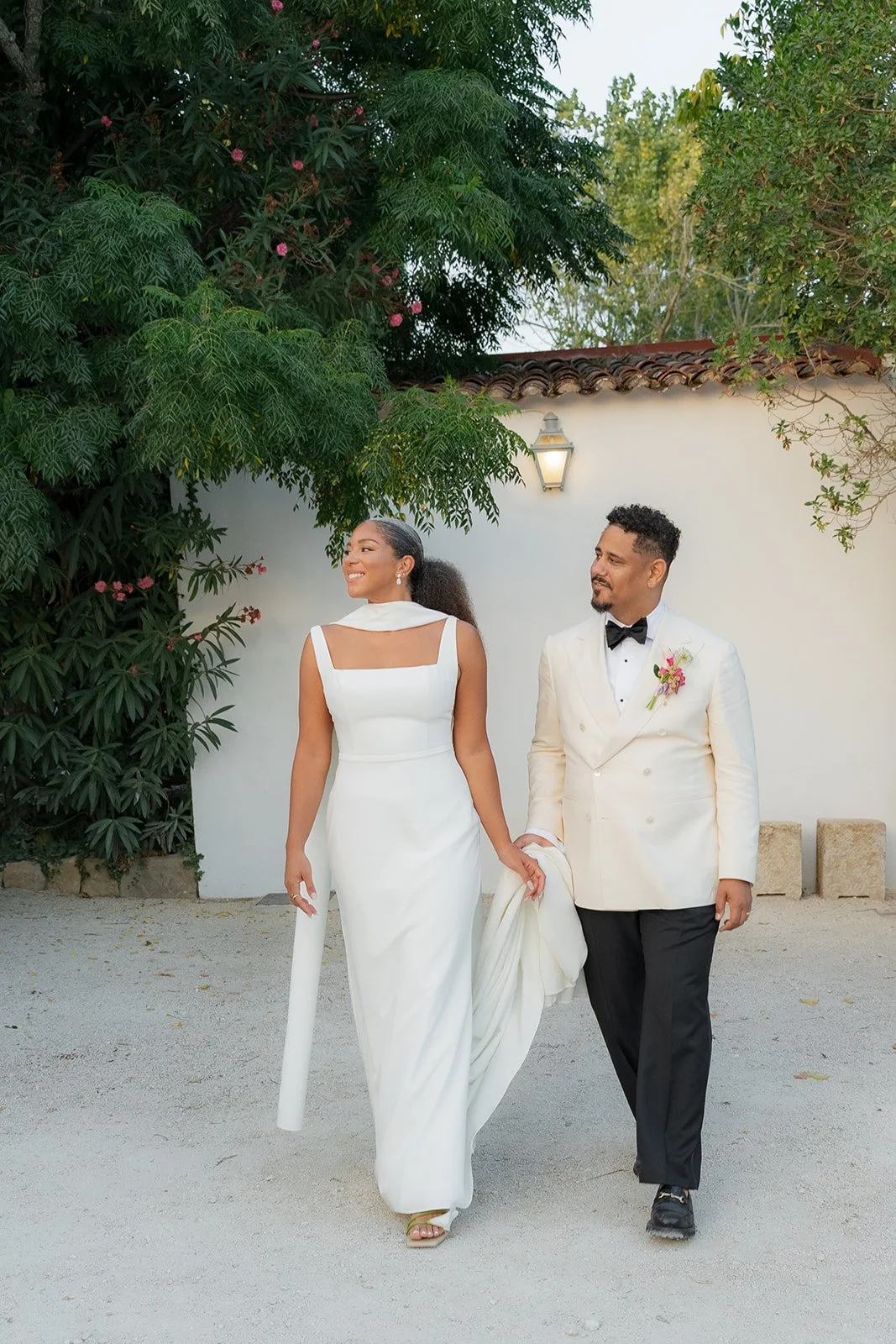 Bride and groom walking outside at Casa Sacoto
