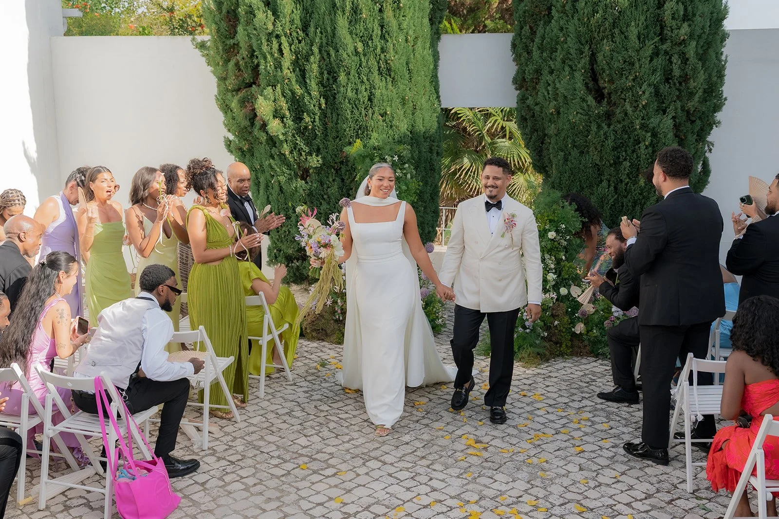 Couple leaving ceremony at Casa Sacoto, Lisbon
