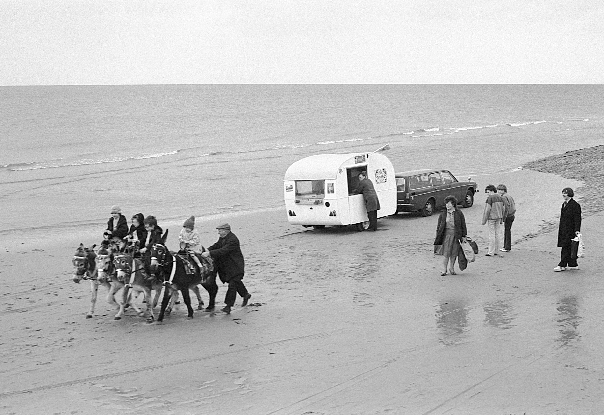 Stephen Clarke Donkeys and caravan on the beach 1980s_.jpg