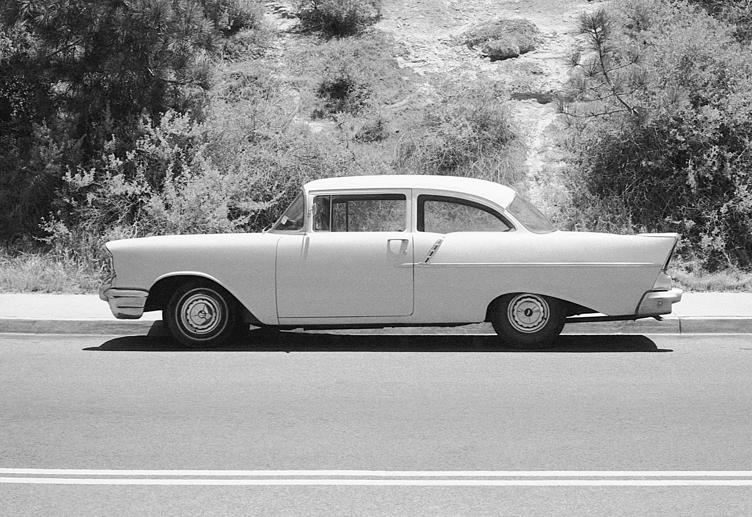 Stephen Clarke Car and hillside San Diego 1987.jpg