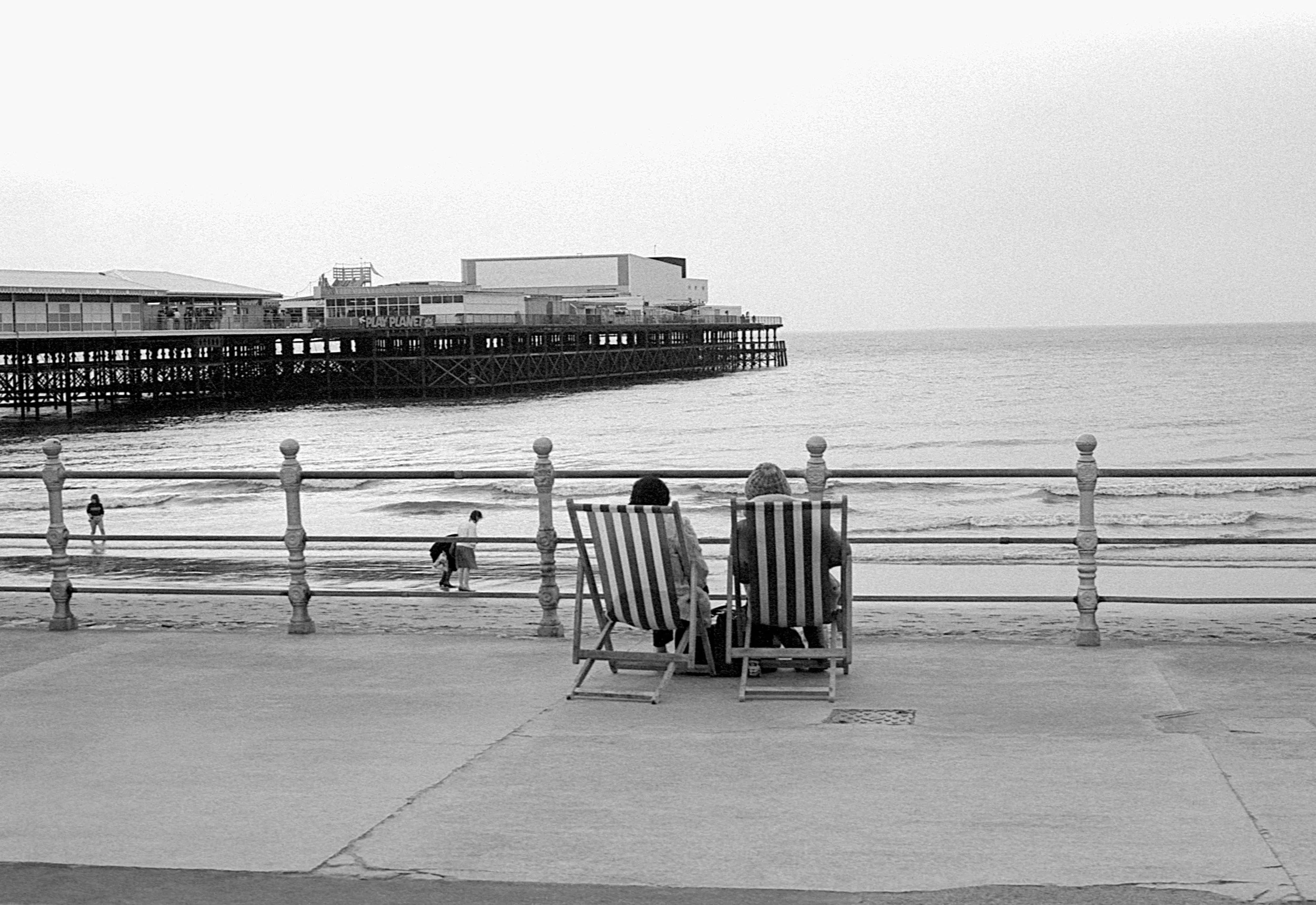 Stephen Clarke Deckchairs and pier 1980s_.jpg