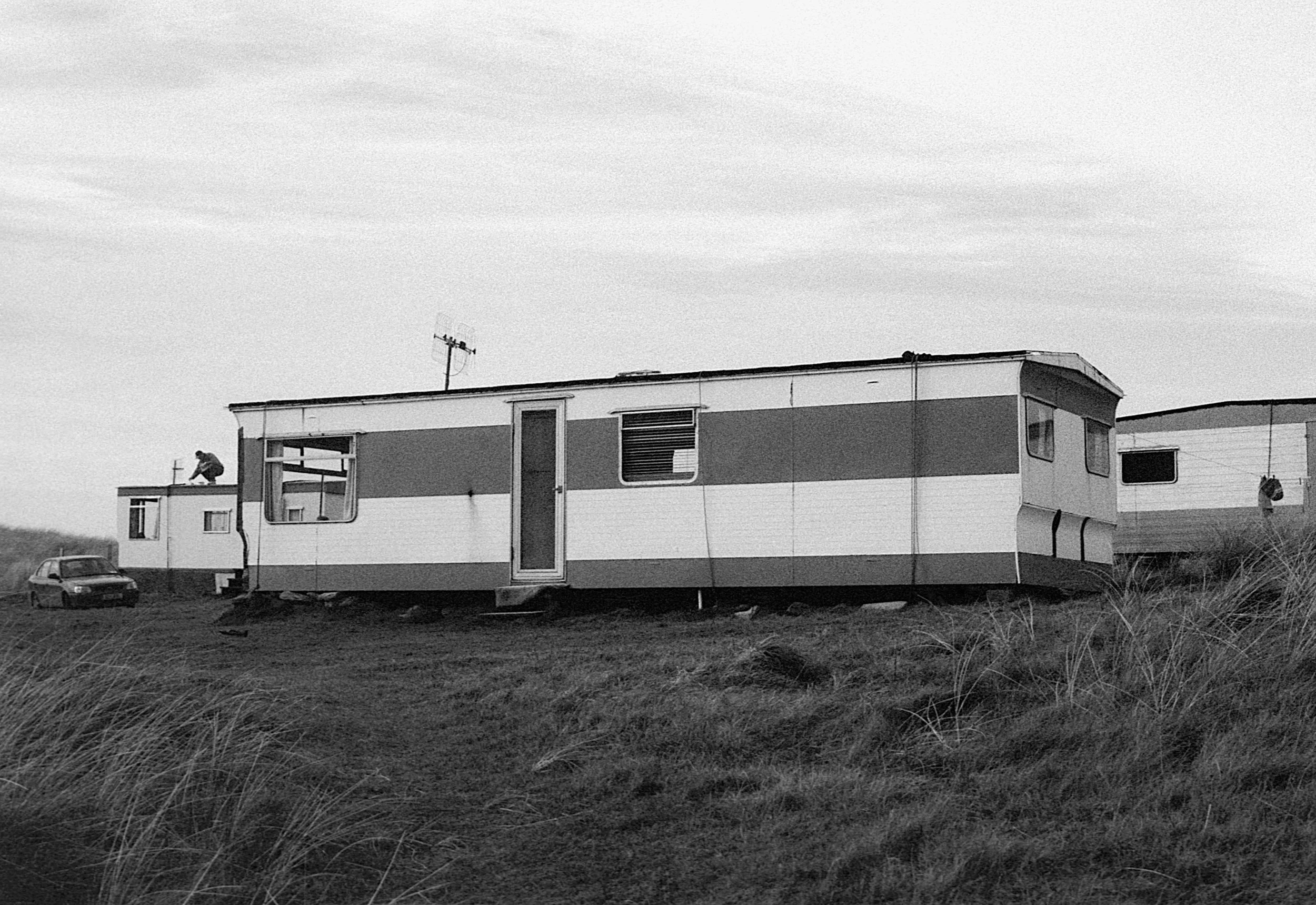 Stephen Clarke Man on caravan roof Ireland 2004.jpg