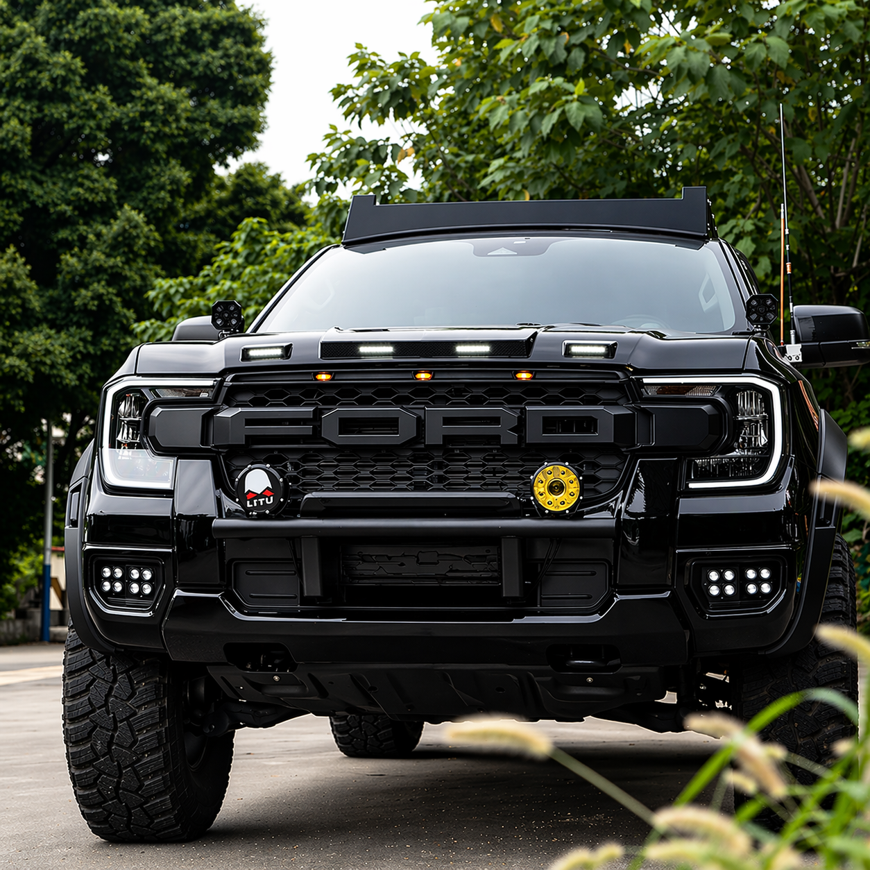 Aggressive black off-road Ford truck.png