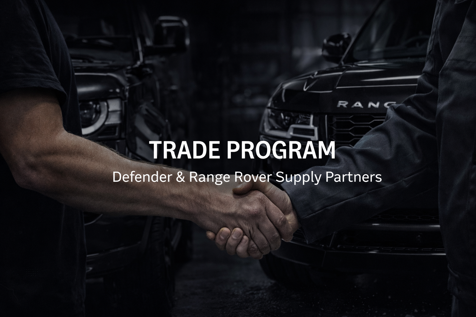 Two men shaking hands in front of black Range Rovers in a dimly lit garage, with text overlay reading "Trade Program" and "Defender & Range Rover Supply Partners."