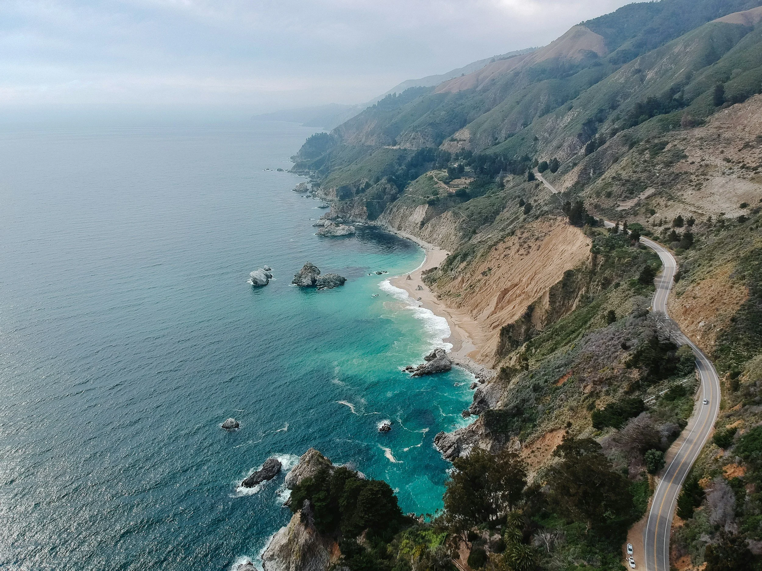 Highway 1 winding along the Big Sur coastline in California