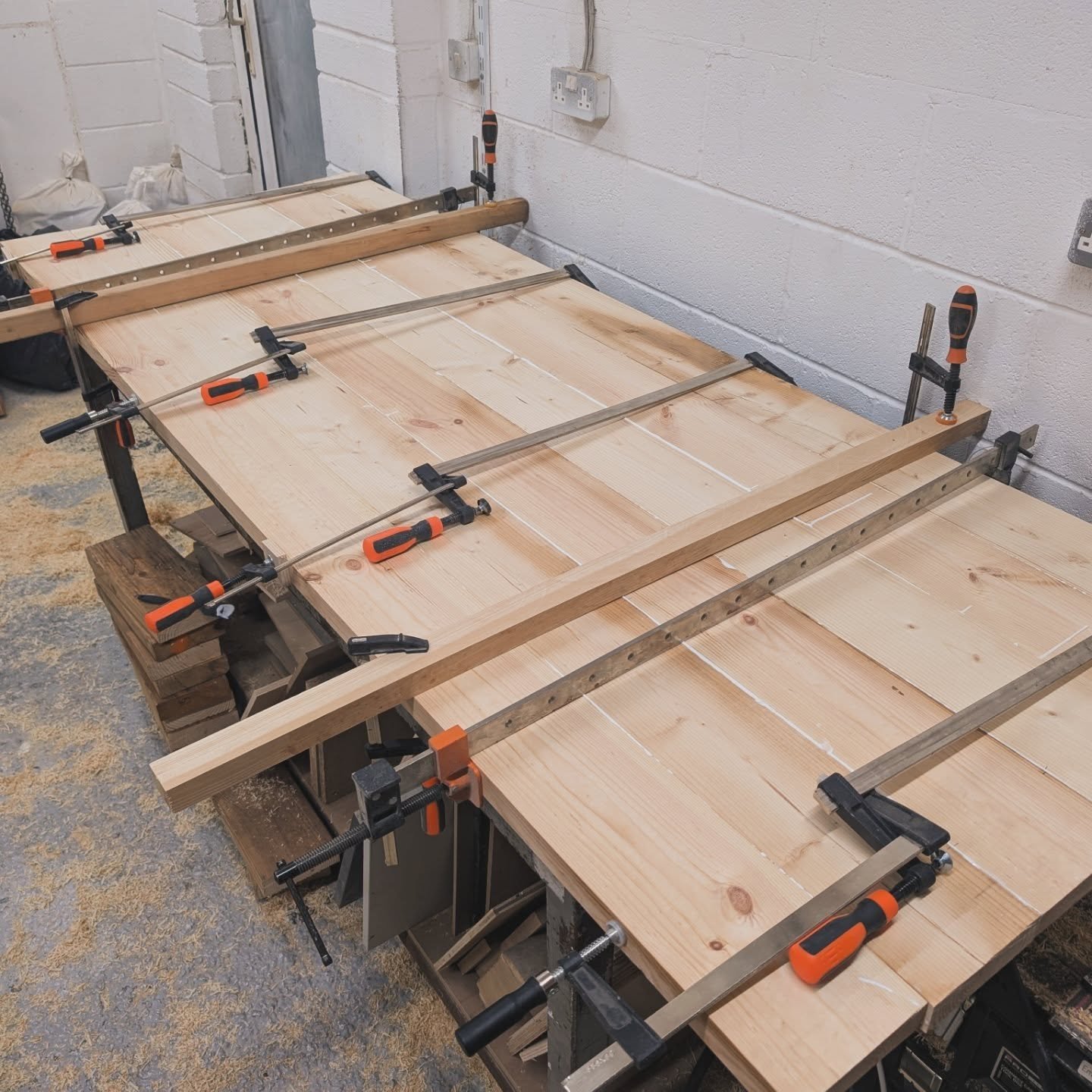Tabletop glue up for current project.
#Woodworking #HandmadeFurniture #Woodwork #Carpentry #DIYWoodwork #customfurniture