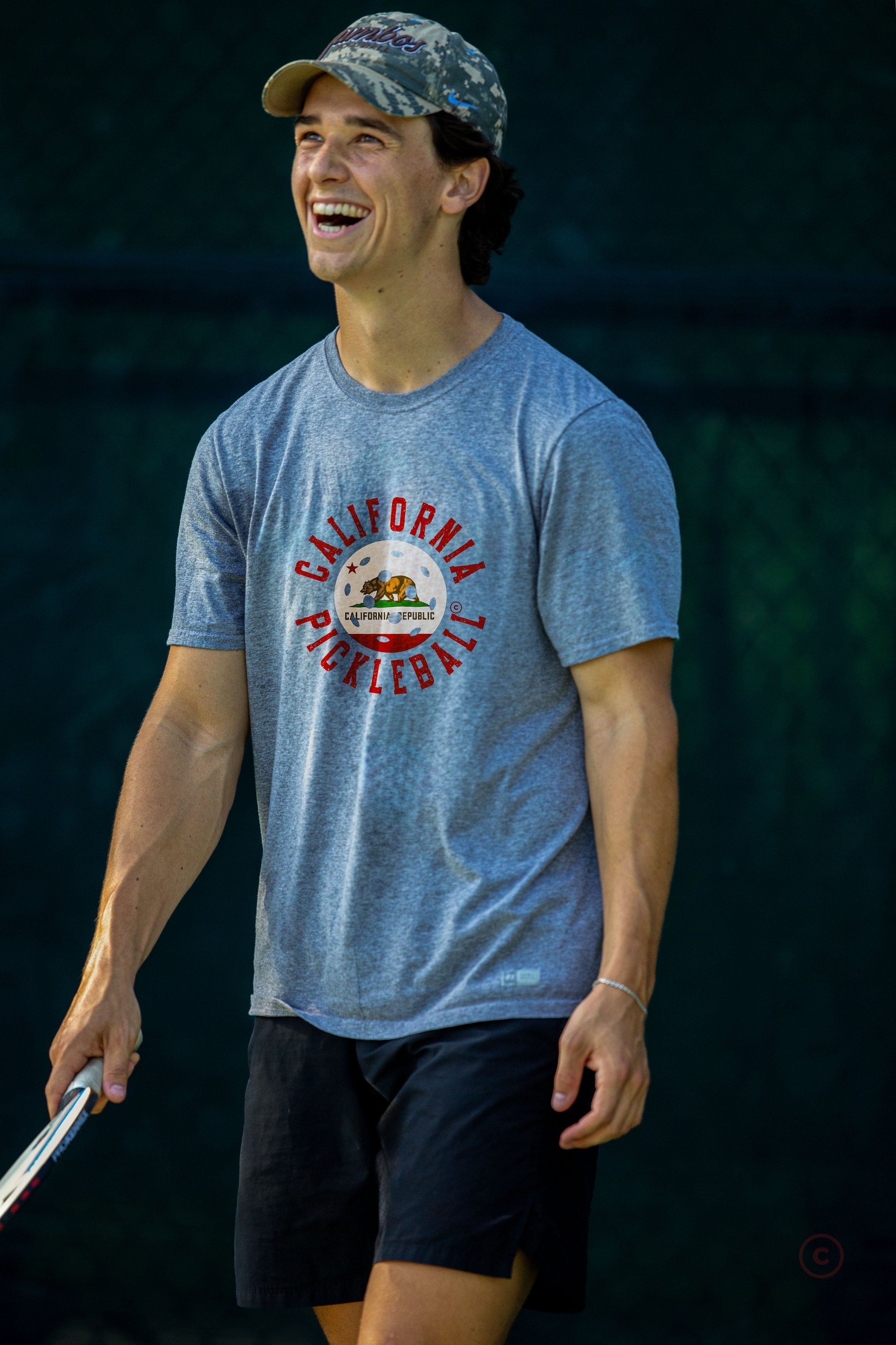 Player wearing the PickleBlast Apparel's California Flag pickleball t-shirt.