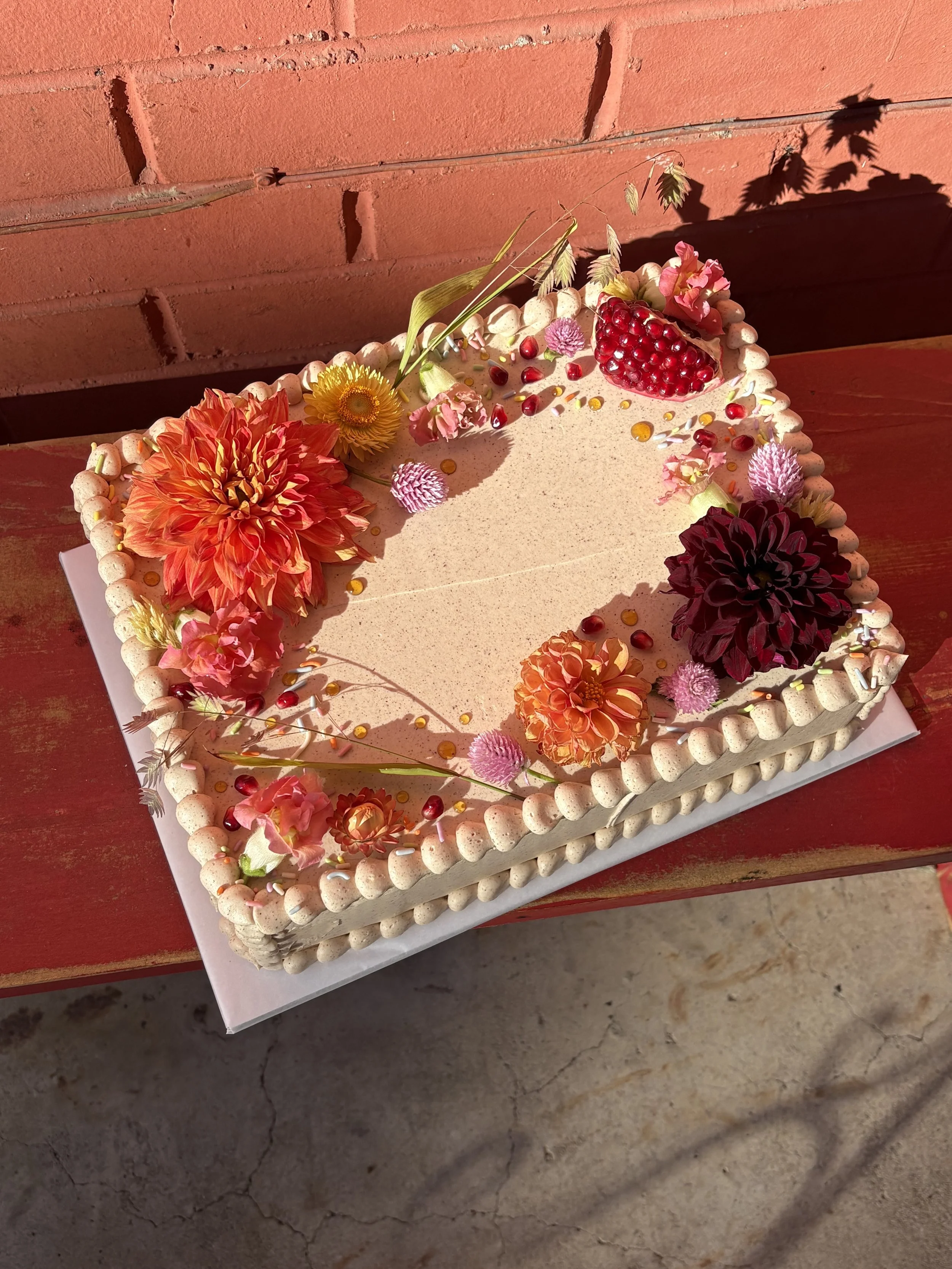 spiced sorghum chiffon / salted maple soak / toasted pecan cream / blueberry jam / cinnamon italian meringue buttercream 