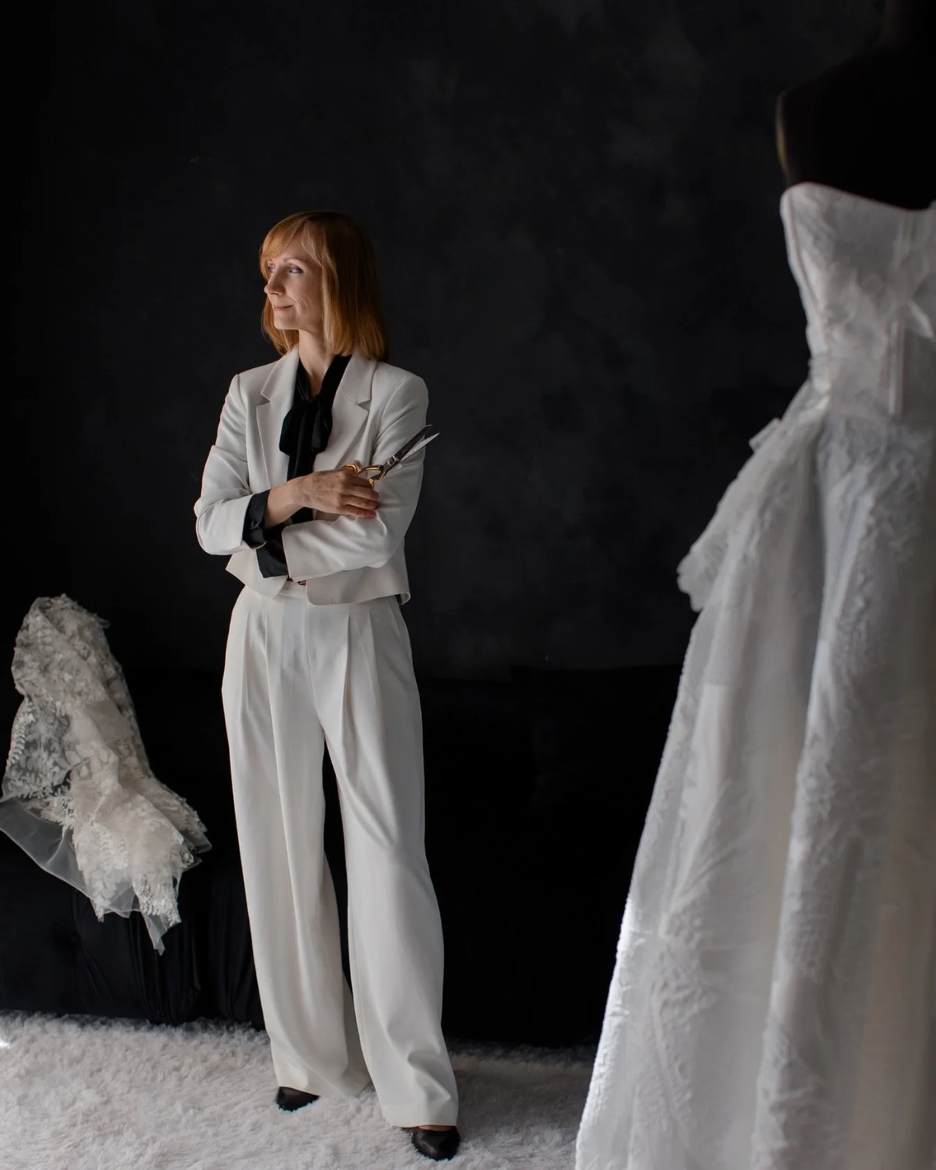 Darya in the atelier bringing the same craftsmanship that shaped wardrobes for Hollywood stars and Broadway productions into every gown she refines today.

From bespoke bridal alterations to complete gown redesigns, her technique is rooted in precisi