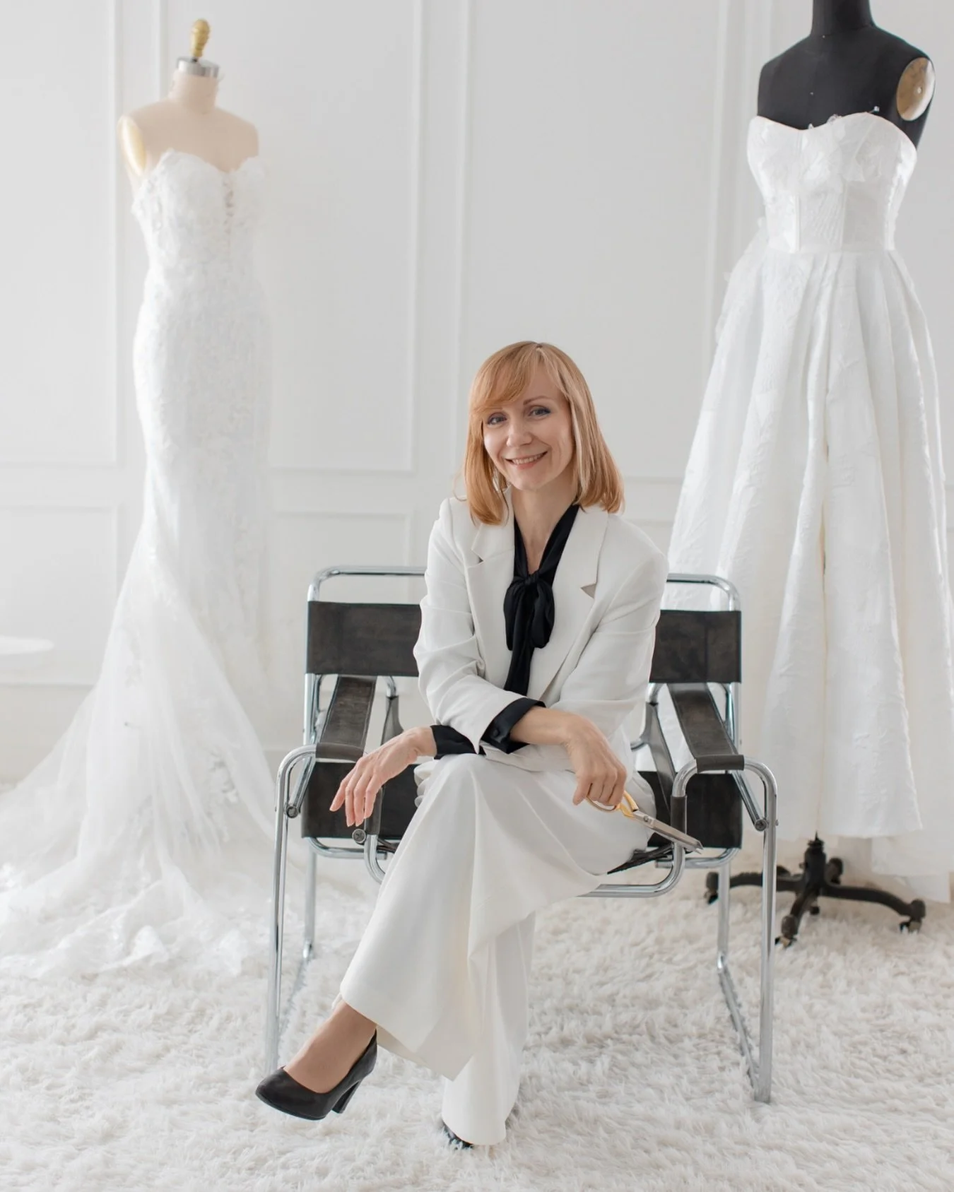 Darya in her element.🤍 Surrounded by gowns, guided by decades of couture experience, and dedicated to the details that transform a dress into the dress.

From Hollywood and Broadway stages to the bridal atelier, her work is defined by precision and 