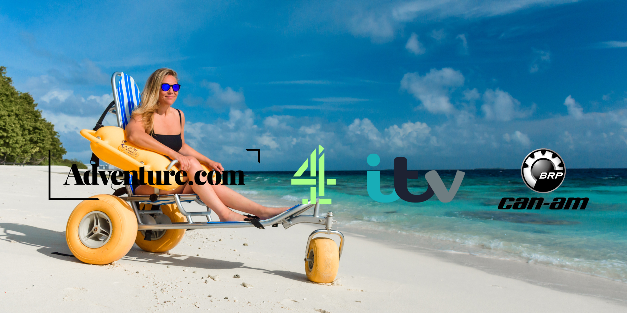 Woman sitting on a beach chair with a yellow floatation device, relaxing on a sandy beach with turquoise ocean and blue sky with clouds.