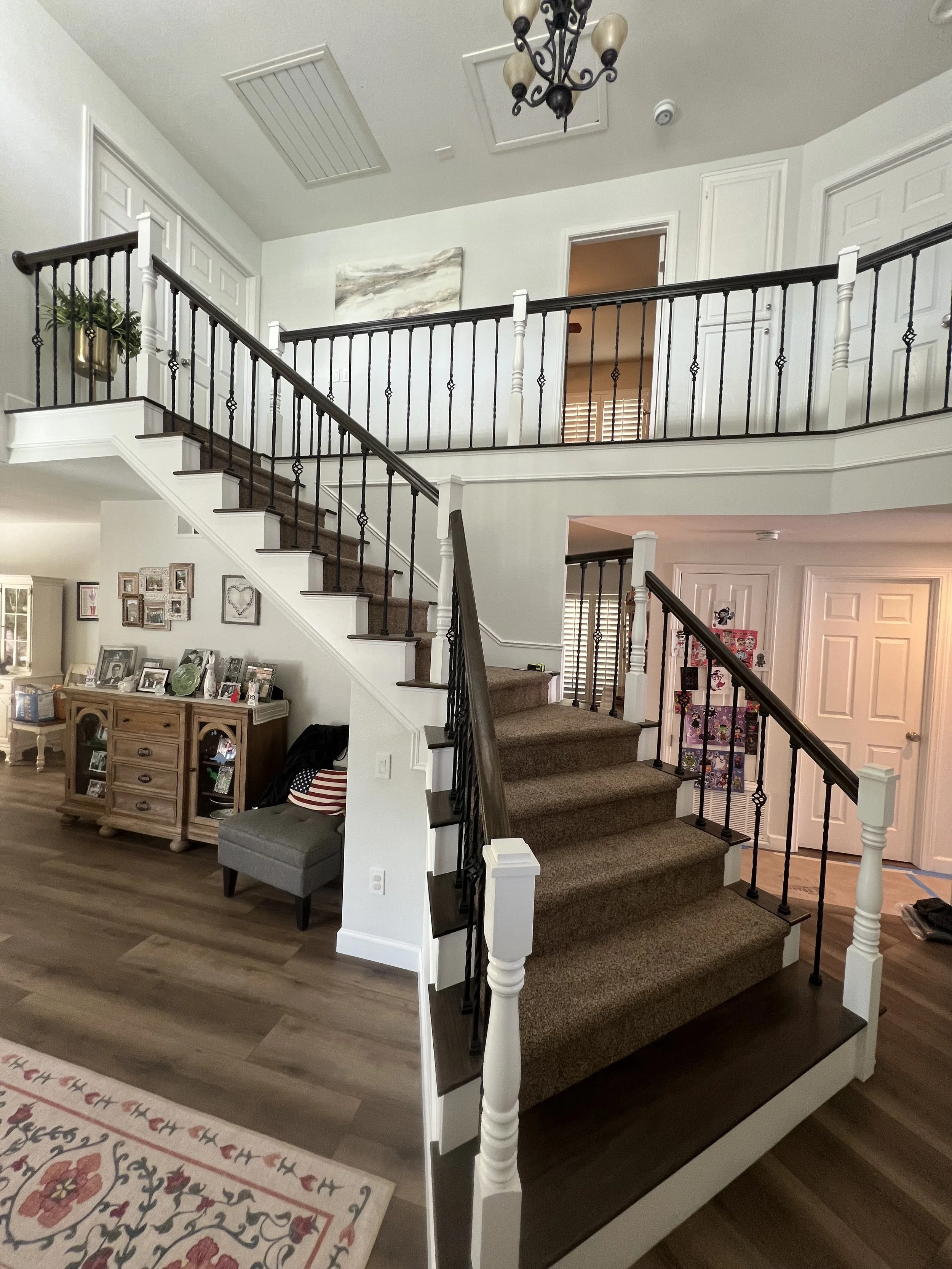 Garcia stairs; new balusters and stained wood, new carpet, new paint on newel posts and skirting