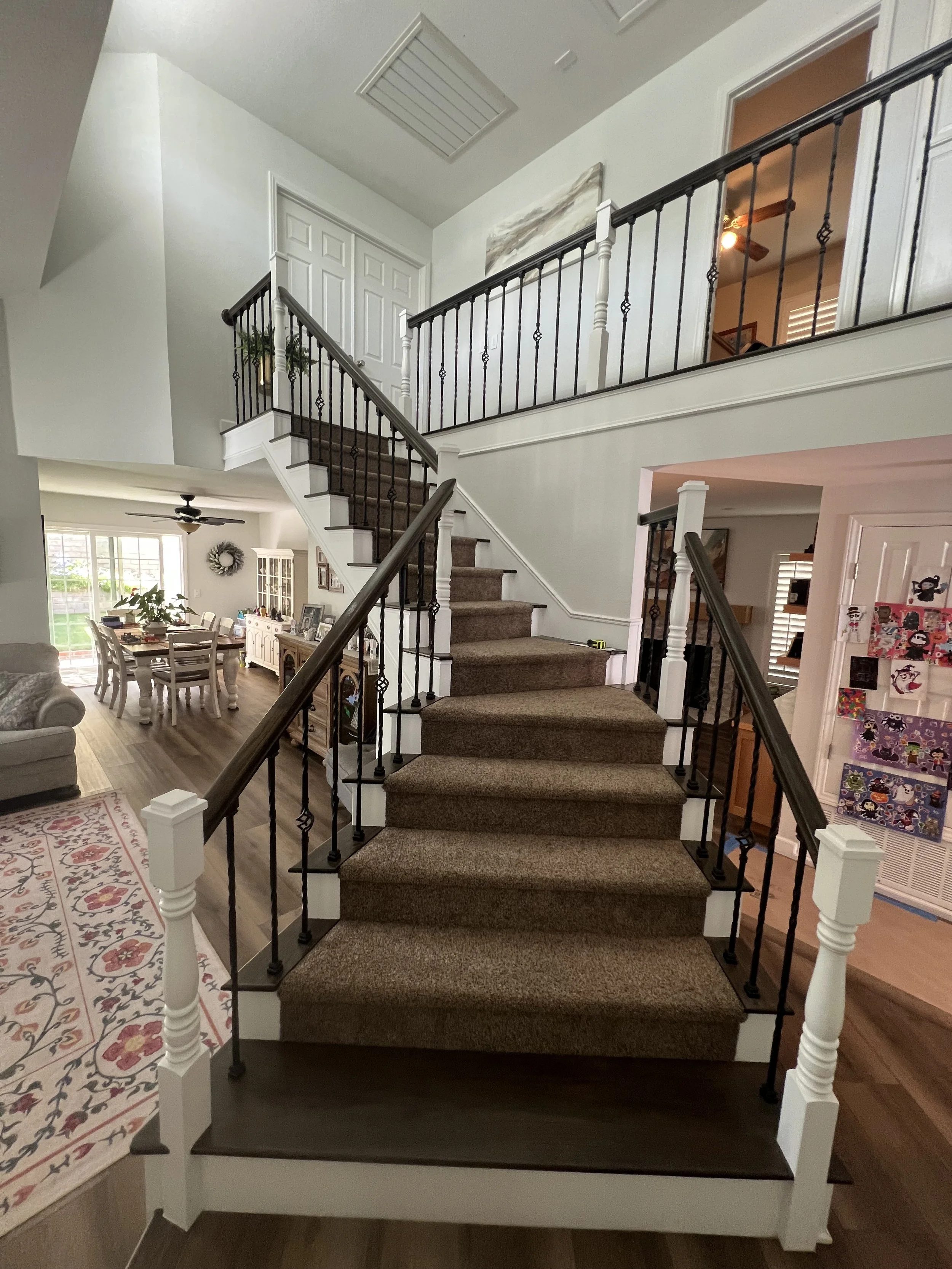 Garcia stairs; new balusters and stained wood, new carpet, new paint on newel posts and skirting