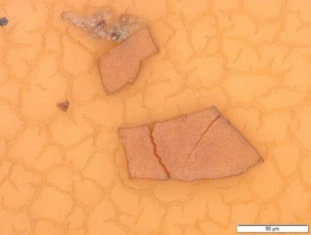 Picture4- dessert granular varnish with hardened varnish particle.jpg