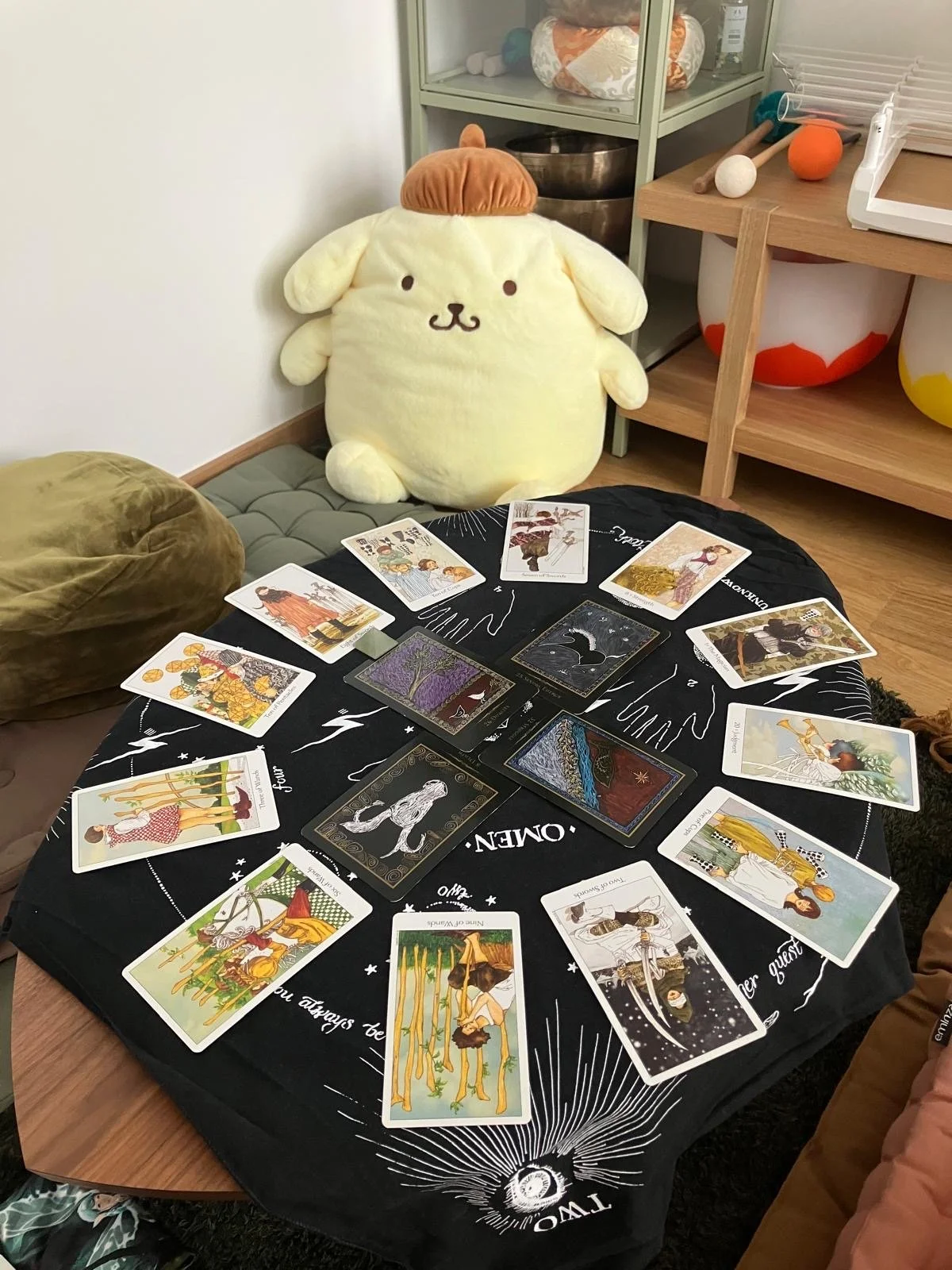 dog plushie with tarot cards